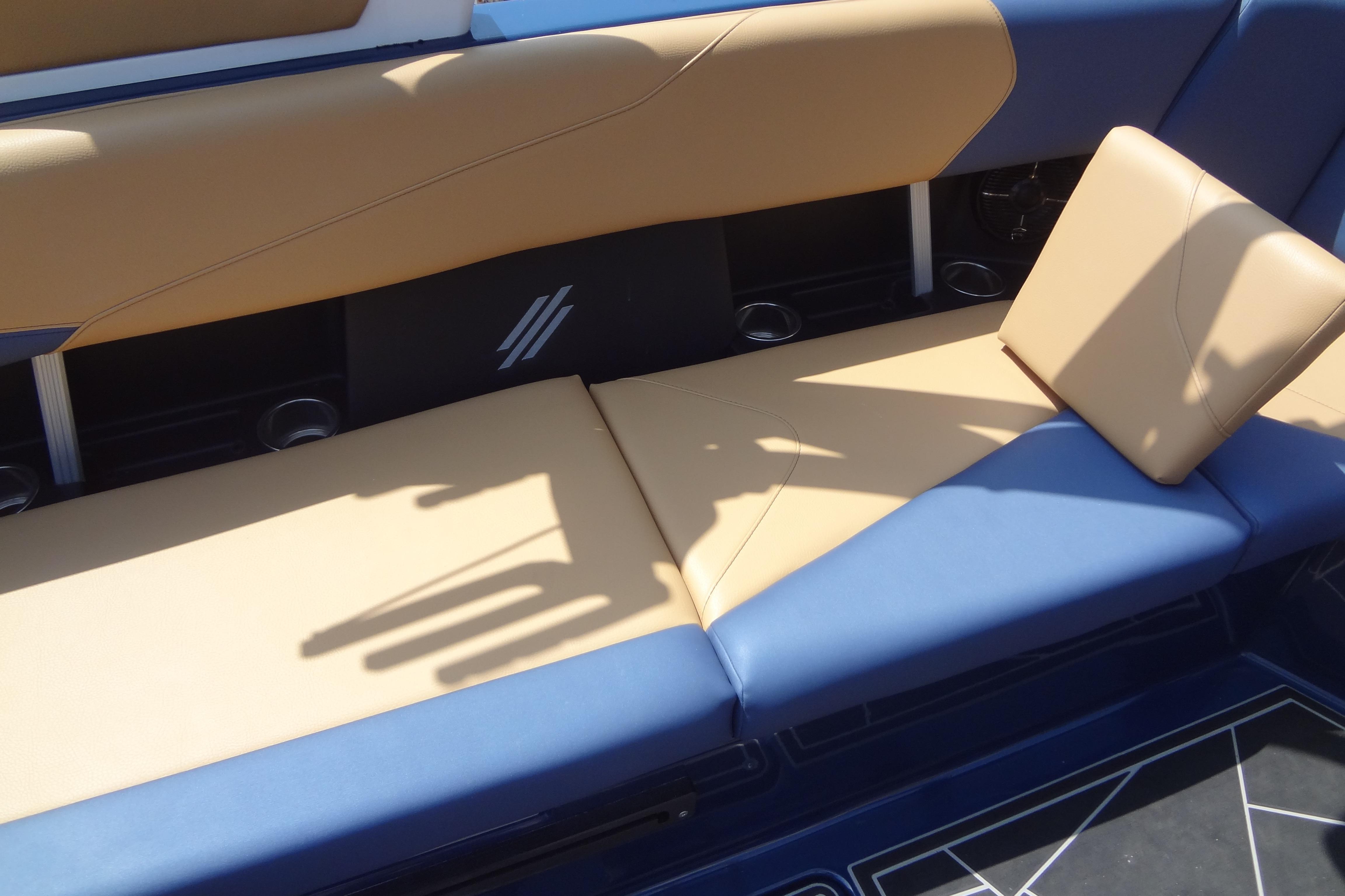 2022 ATX Surf Boats 24 Type-S interior with tan and blue seating.