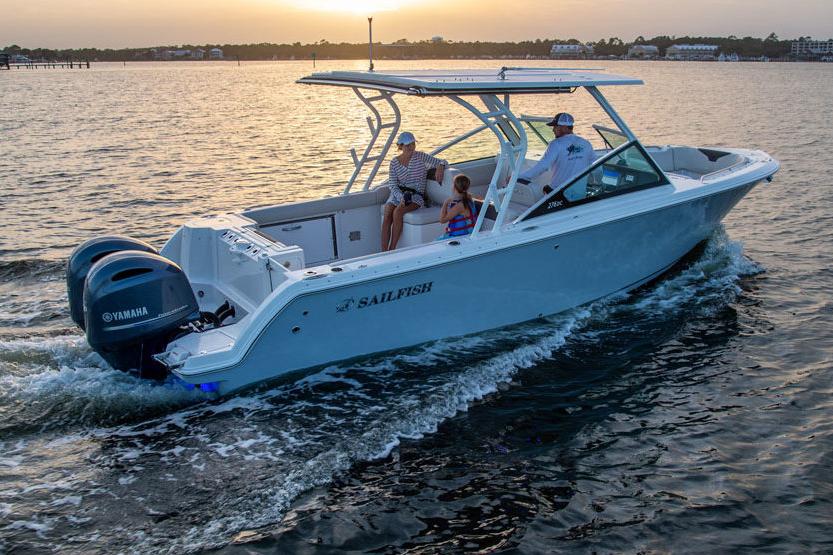 Manufacturer Provided Image: 2021 Sailfish 276 DC boat cruising on water at sunset.