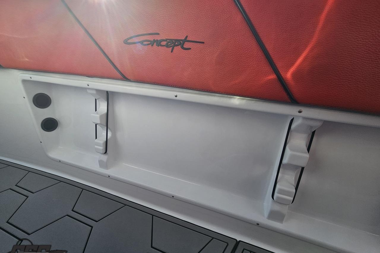 Interior of 2025 Concept 27' CC boat with red upholstery and modern design elements.