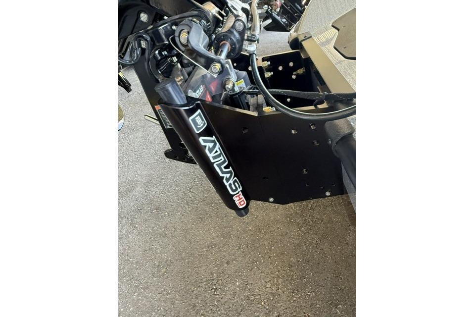 Close-up of 2026 Ranger Z521R Cup-Equipped boat's suspension system with KYB shock absorber.