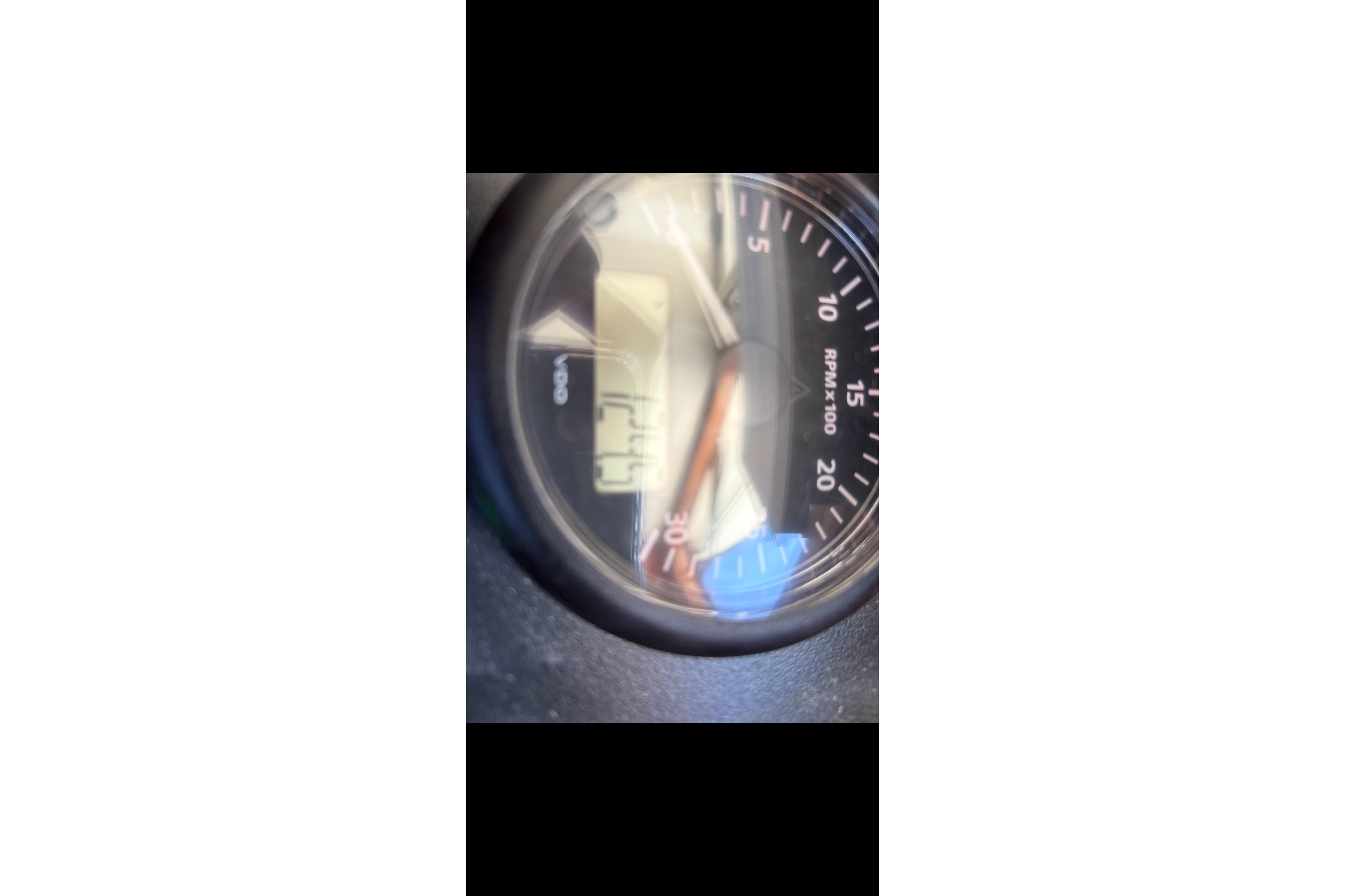 Close-up of a SeaPiper 35 tachometer displaying RPM, model year 2020.