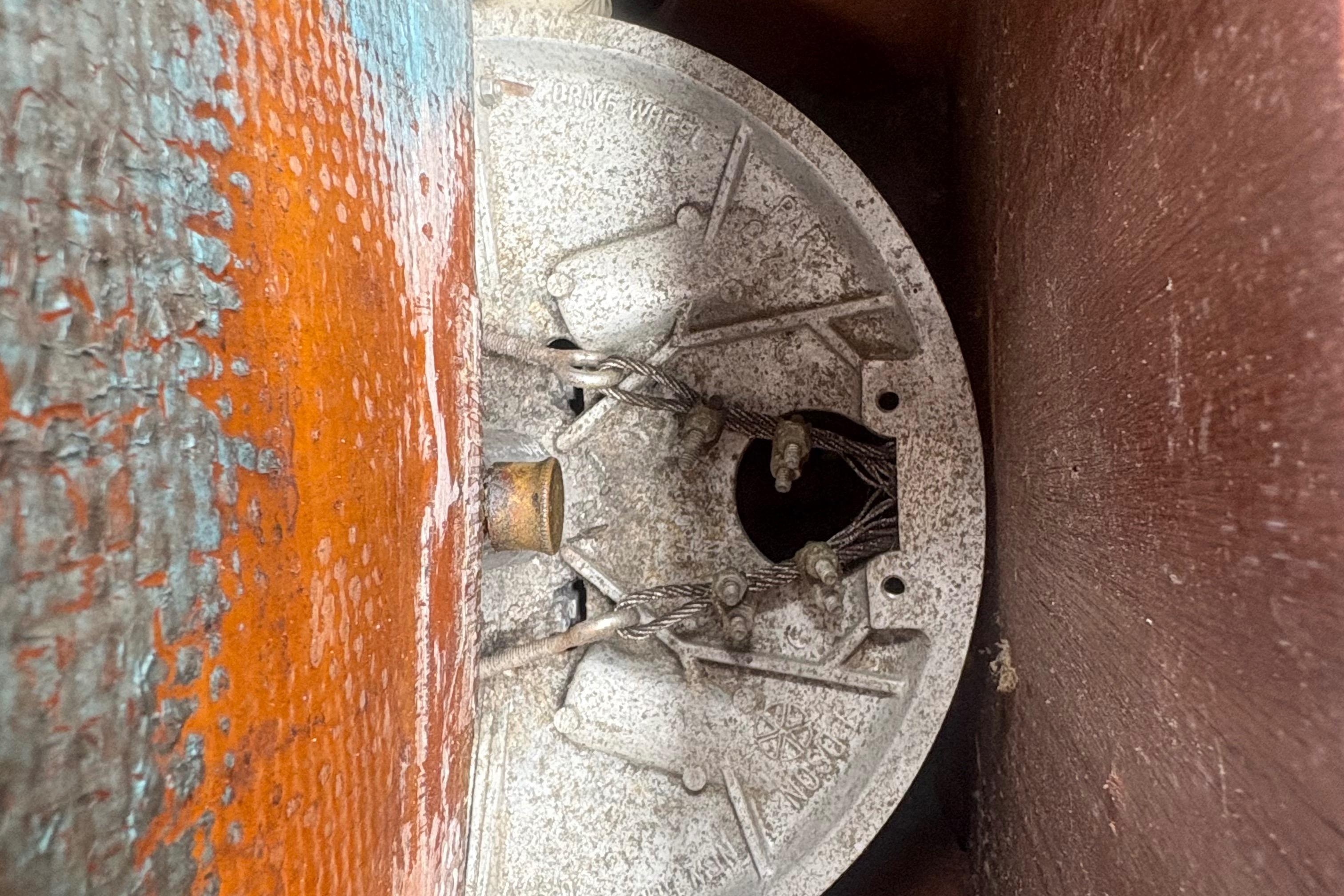 Close-up of a weathered Sabre 31 boat component, showcasing intricate details and textures.