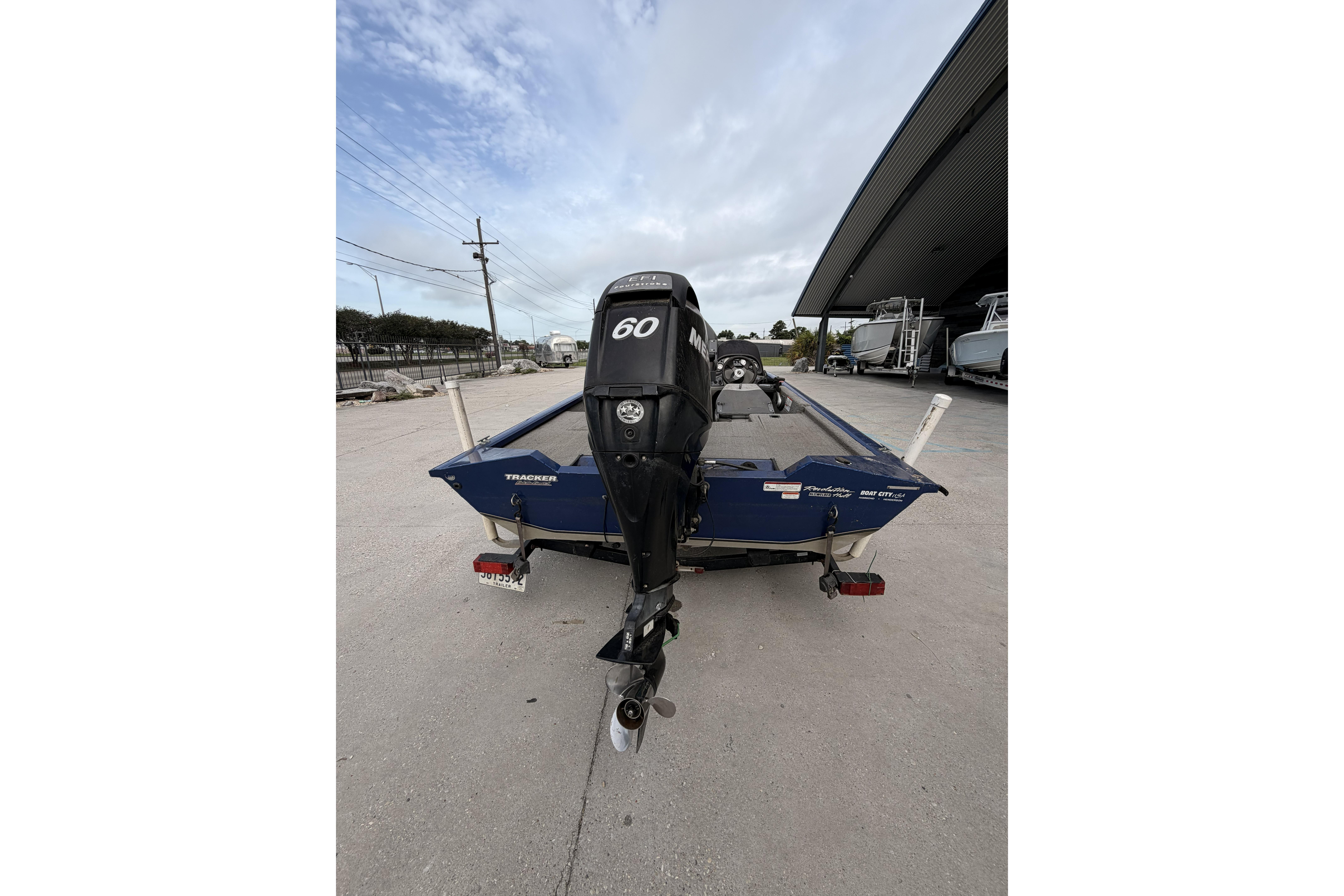 2012 Bass Tracker Pro 17 boat with a 60 HP Mercury outboard motor.