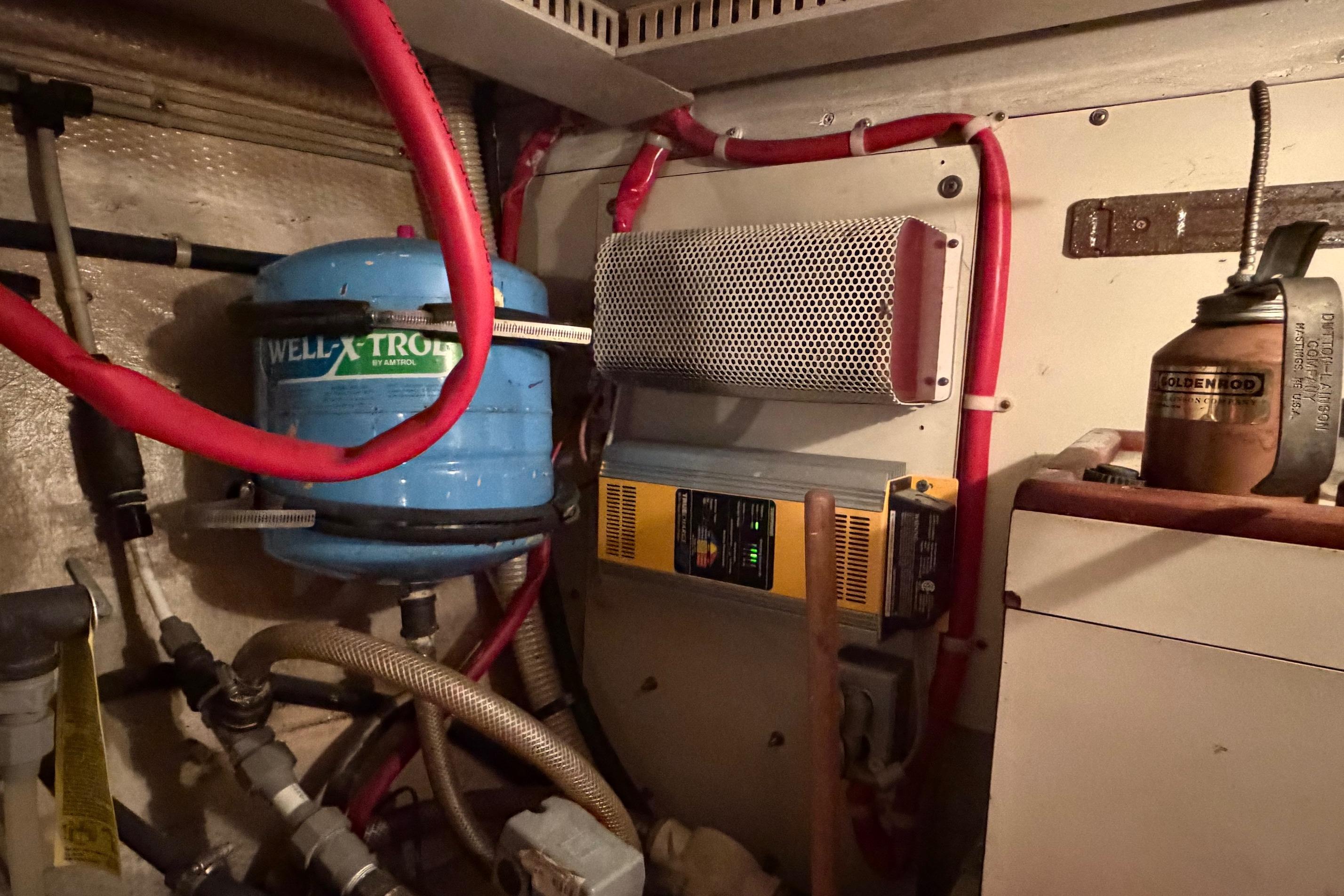 Engine room of 1984 Gulfstar 49 Motor Yacht with Well-X-Trol tank and equipment.