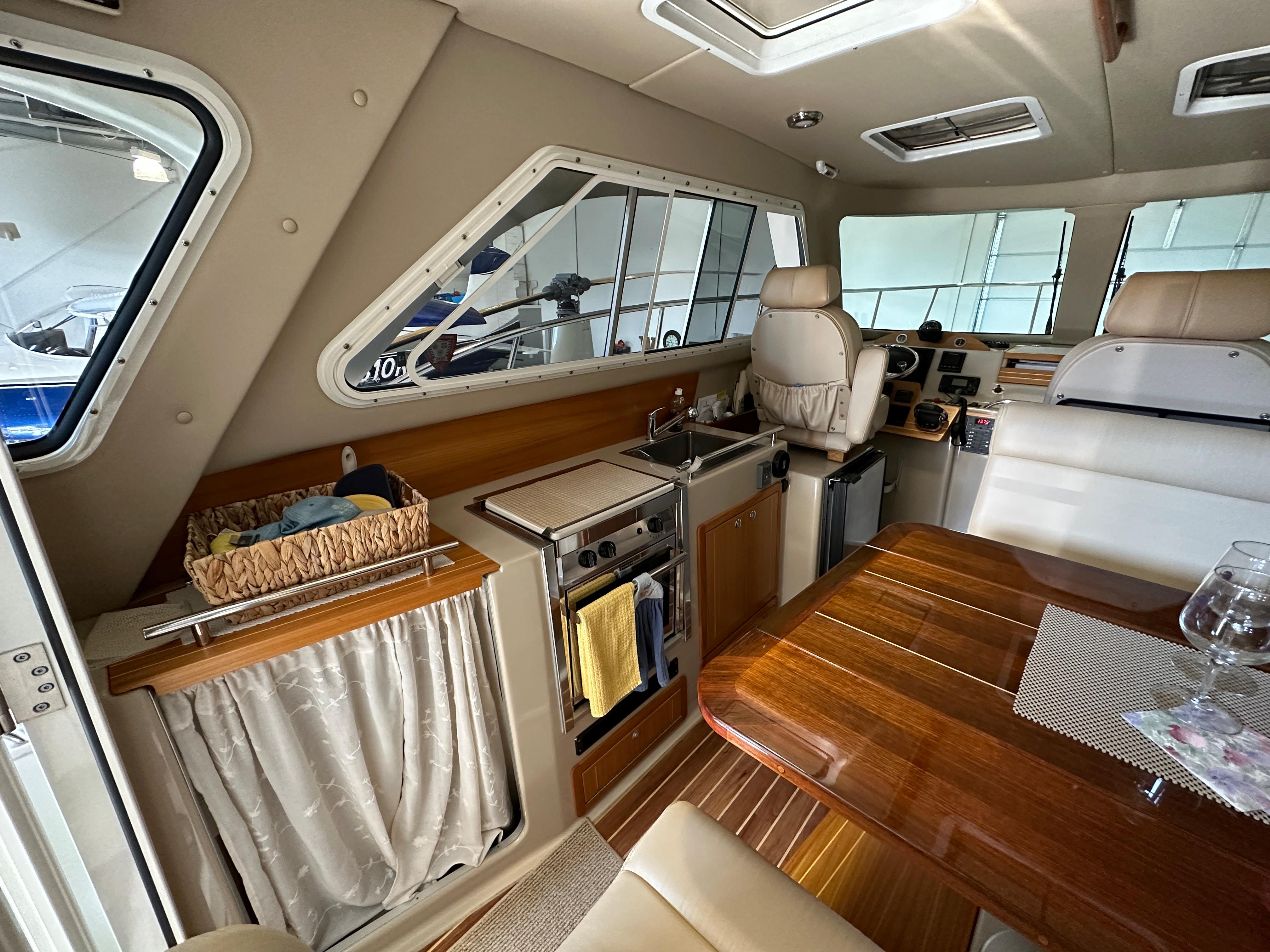Interior of a 2016 Aspen C100 yacht with elegant furnishings.