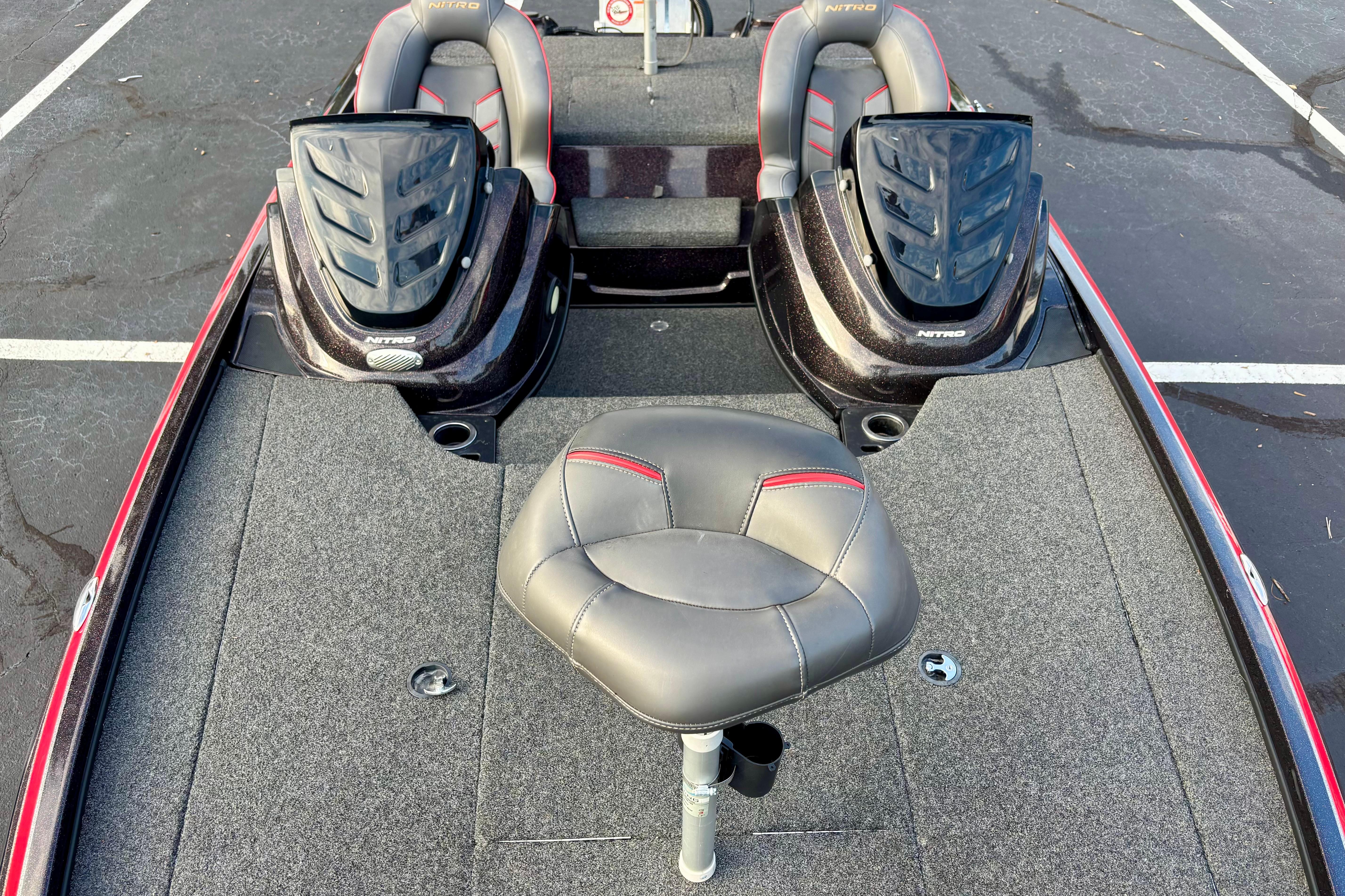 2018 Nitro Z18 boat interior with dual seats and central fishing chair.