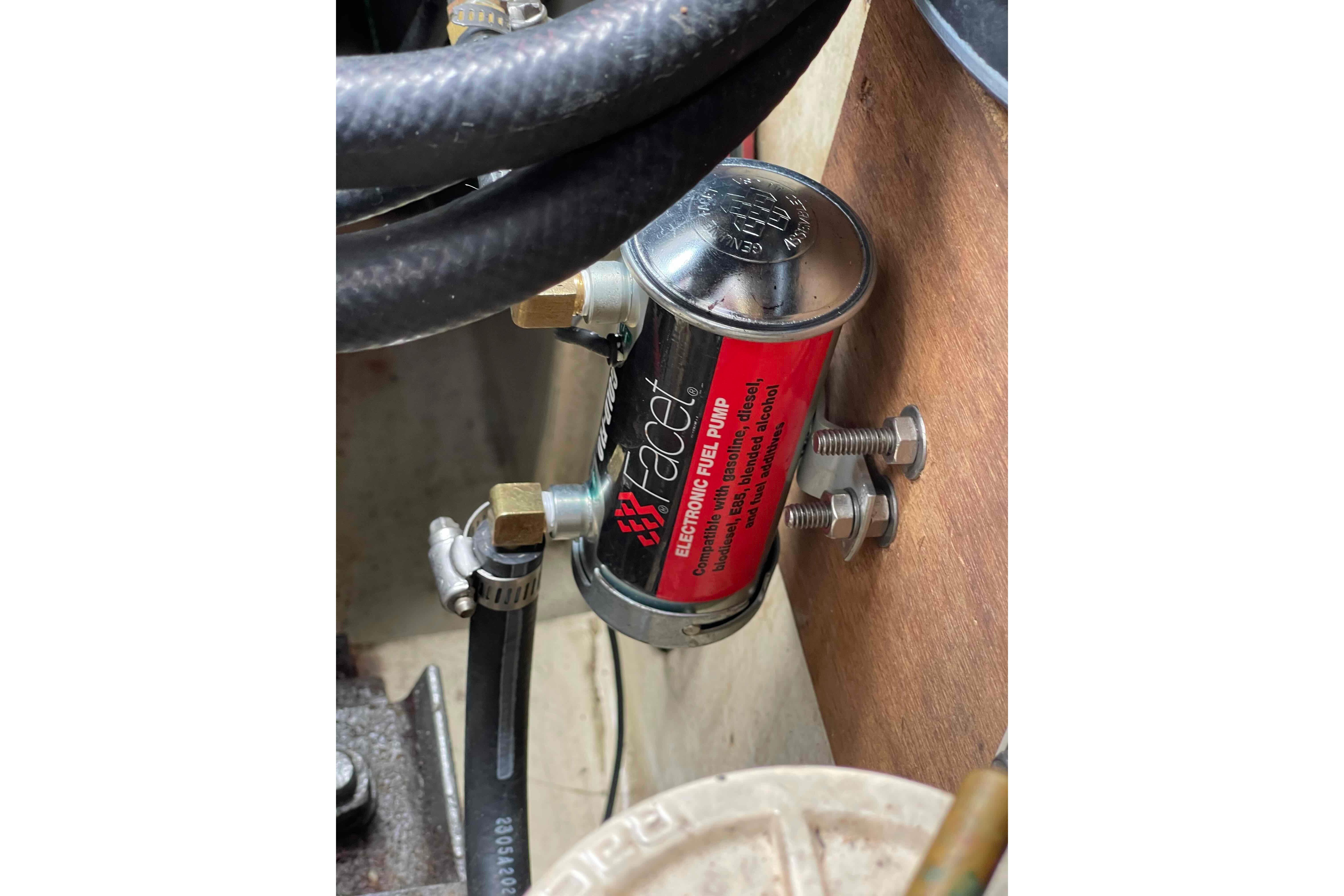 Electronic fuel pump in a 1987 Pacific Seacraft 34 sailboat engine compartment.