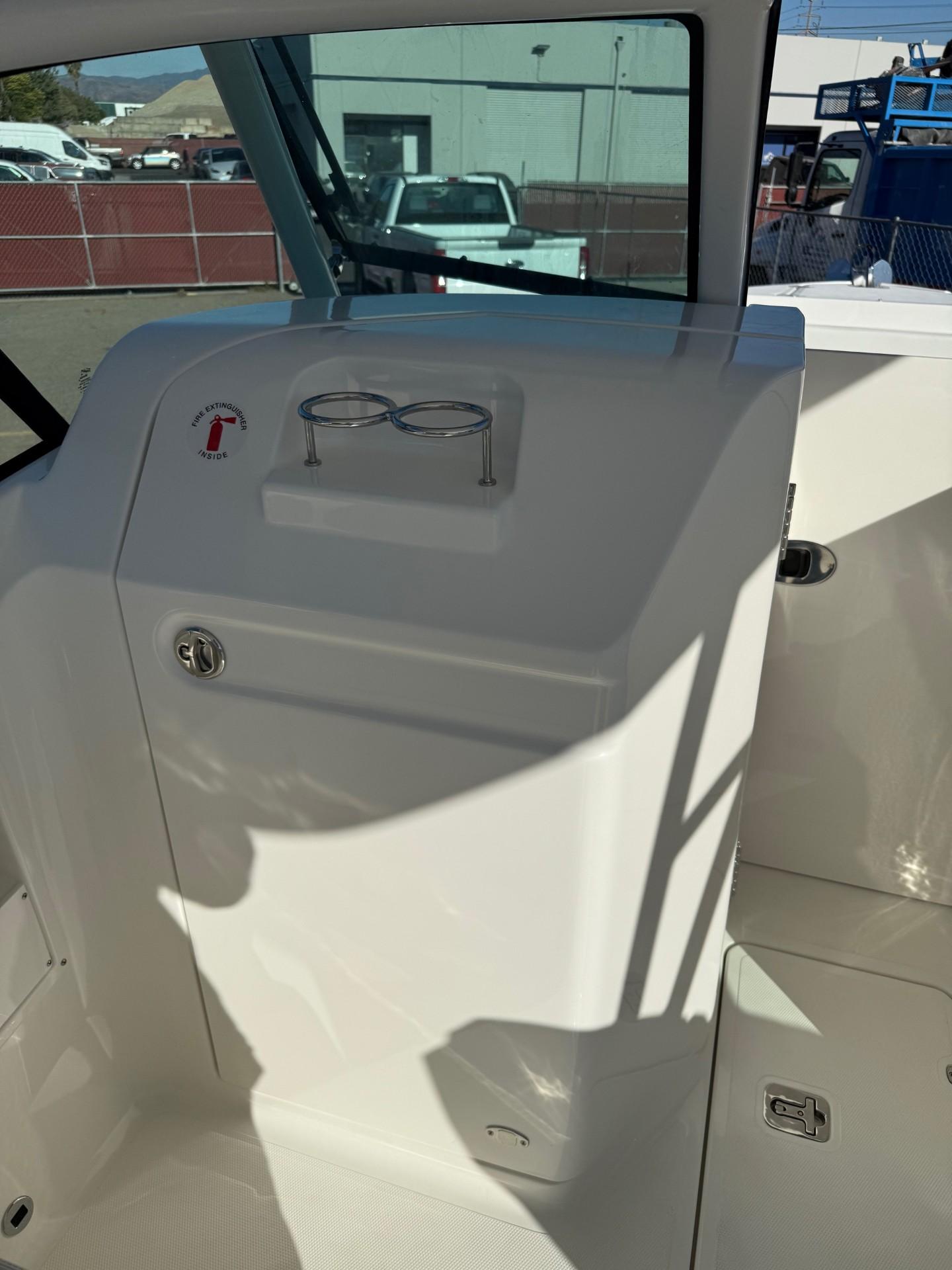 2025 Pursuit DC 246 Dual Console interior with sleek dashboard design.