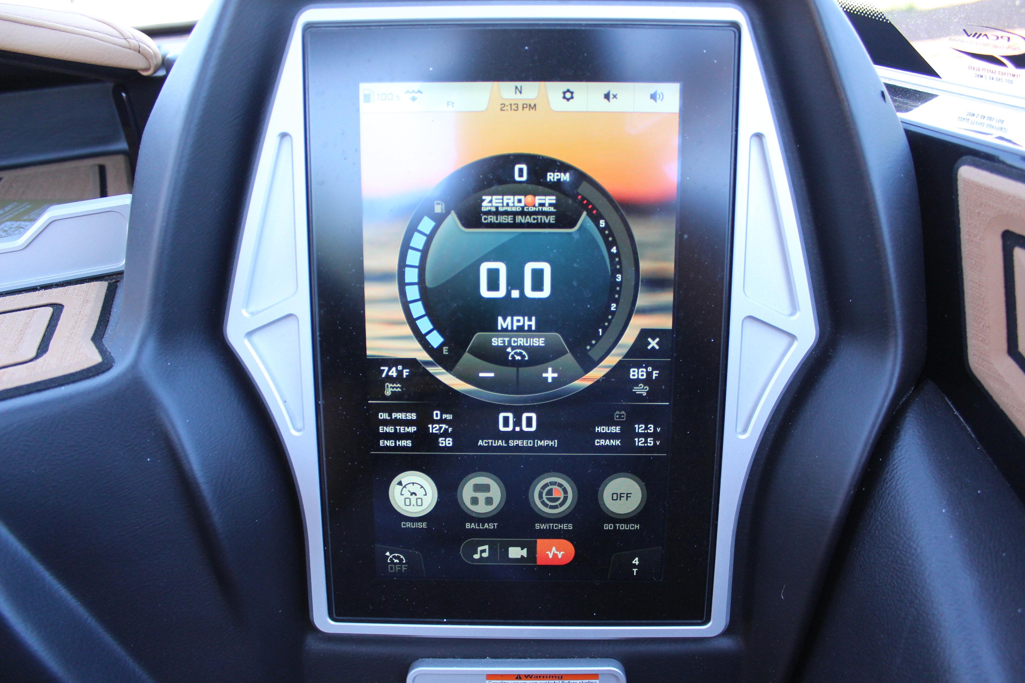 Touchscreen display of a 2022 Tigé 22RZX boat showing speed and control settings.