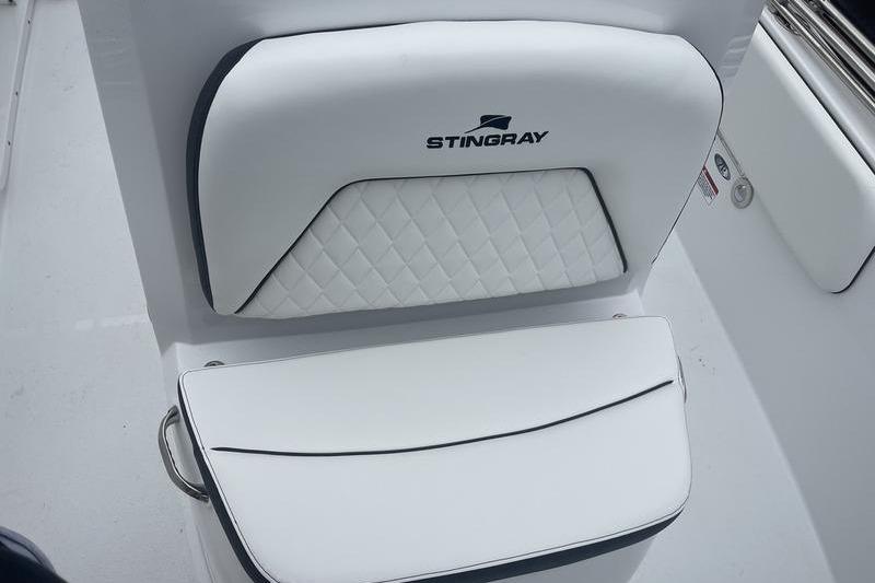 2025 Stingray 173CC boat seat with white quilted upholstery and logo.