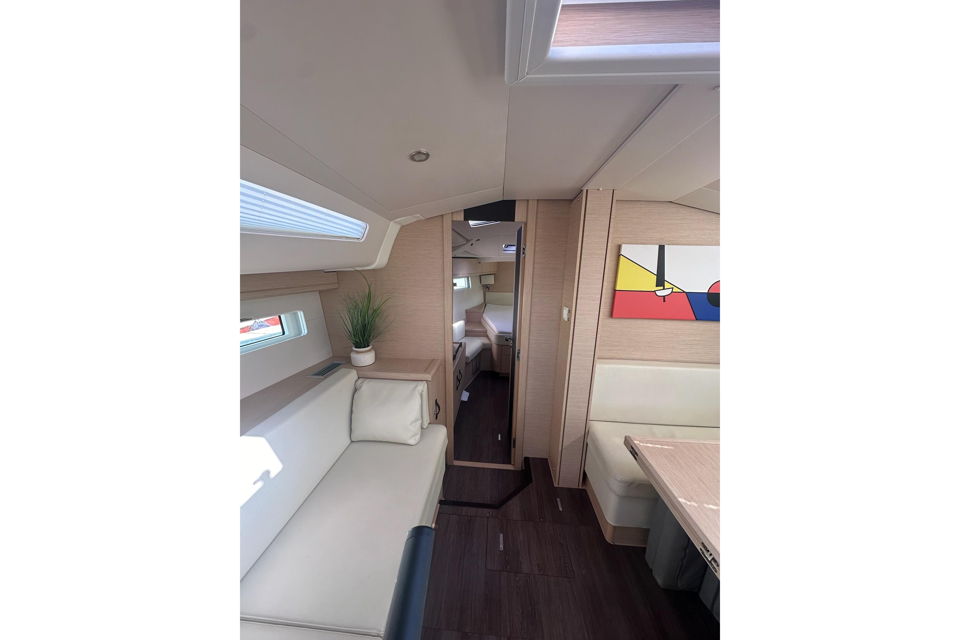 Interior of 2018 Jeanneau 51 yacht, featuring modern design and comfortable seating.