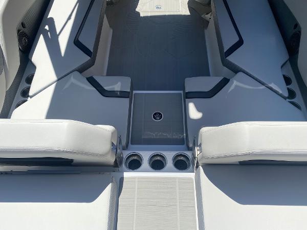 2025 Scarab 235 SE boat interior with sleek seating and cup holders.