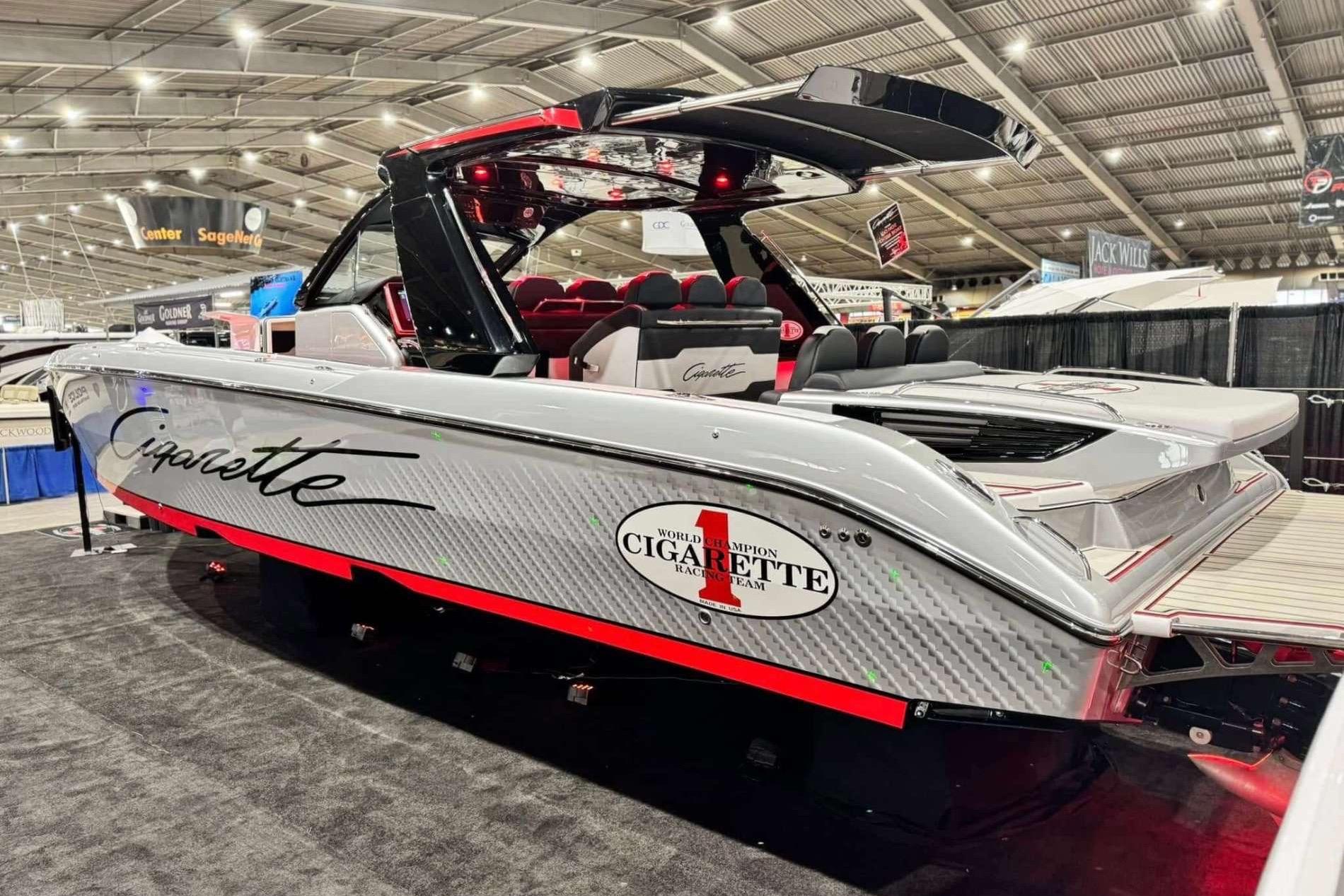 2024 Cigarette 41' Nighthawk SD Edition boat displayed at an indoor exhibition.