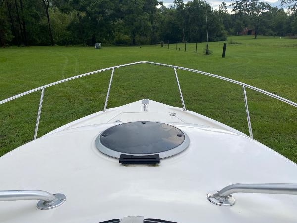 Bow view of 2008 Sea Fox 236WA Pro Series boat on grassy field.