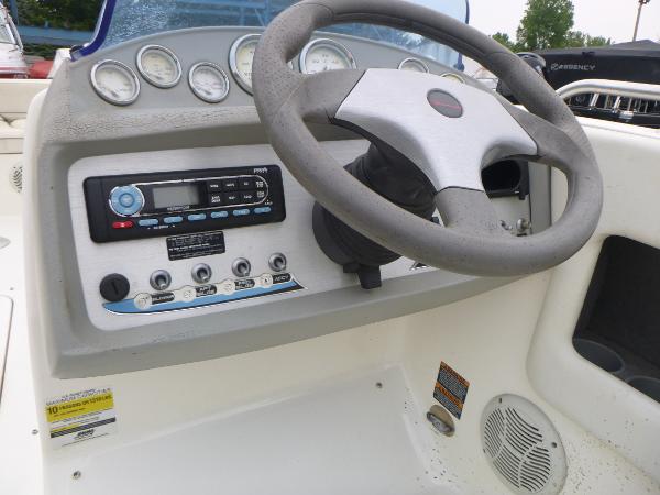 2007 Bayliner 197 Deck Boat steering console with gauges and controls.