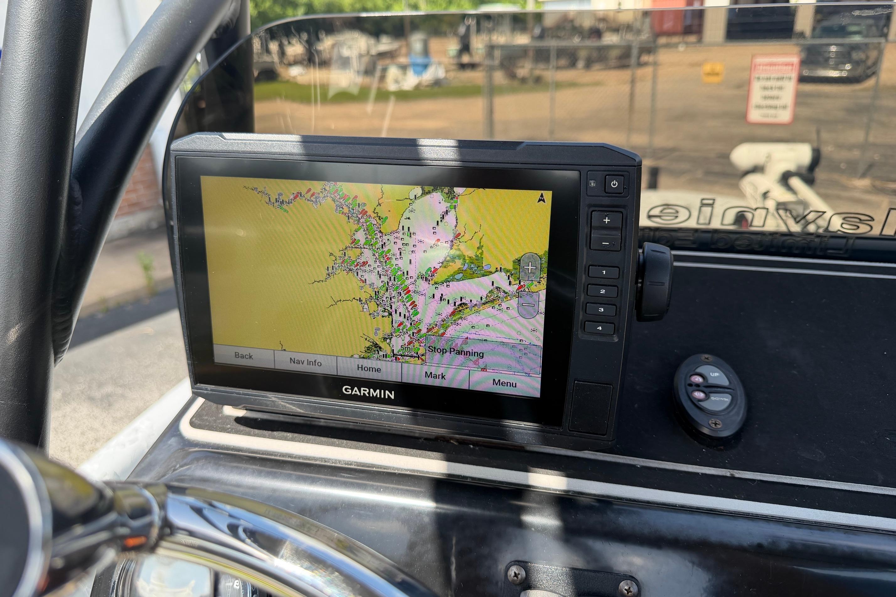 Garmin navigation system on 2023 Haynie 23 Super Cat boat dashboard, displaying a detailed map.