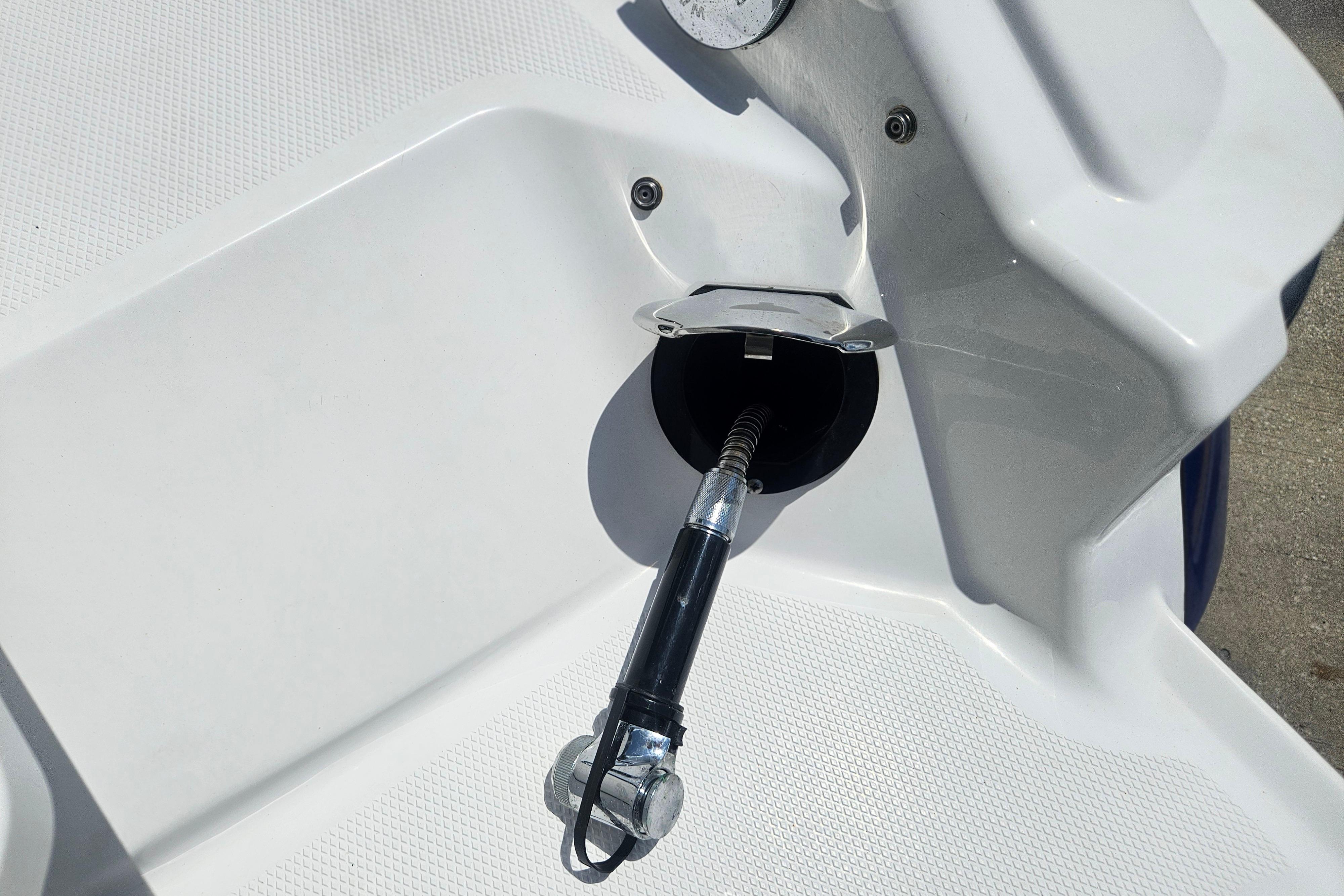 2024 Monterey 215SS Super Sport boat fuel filler cap and nozzle detail.