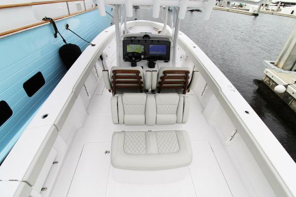 2024 Jupiter 34 HFS boat interior with seating and navigation system.