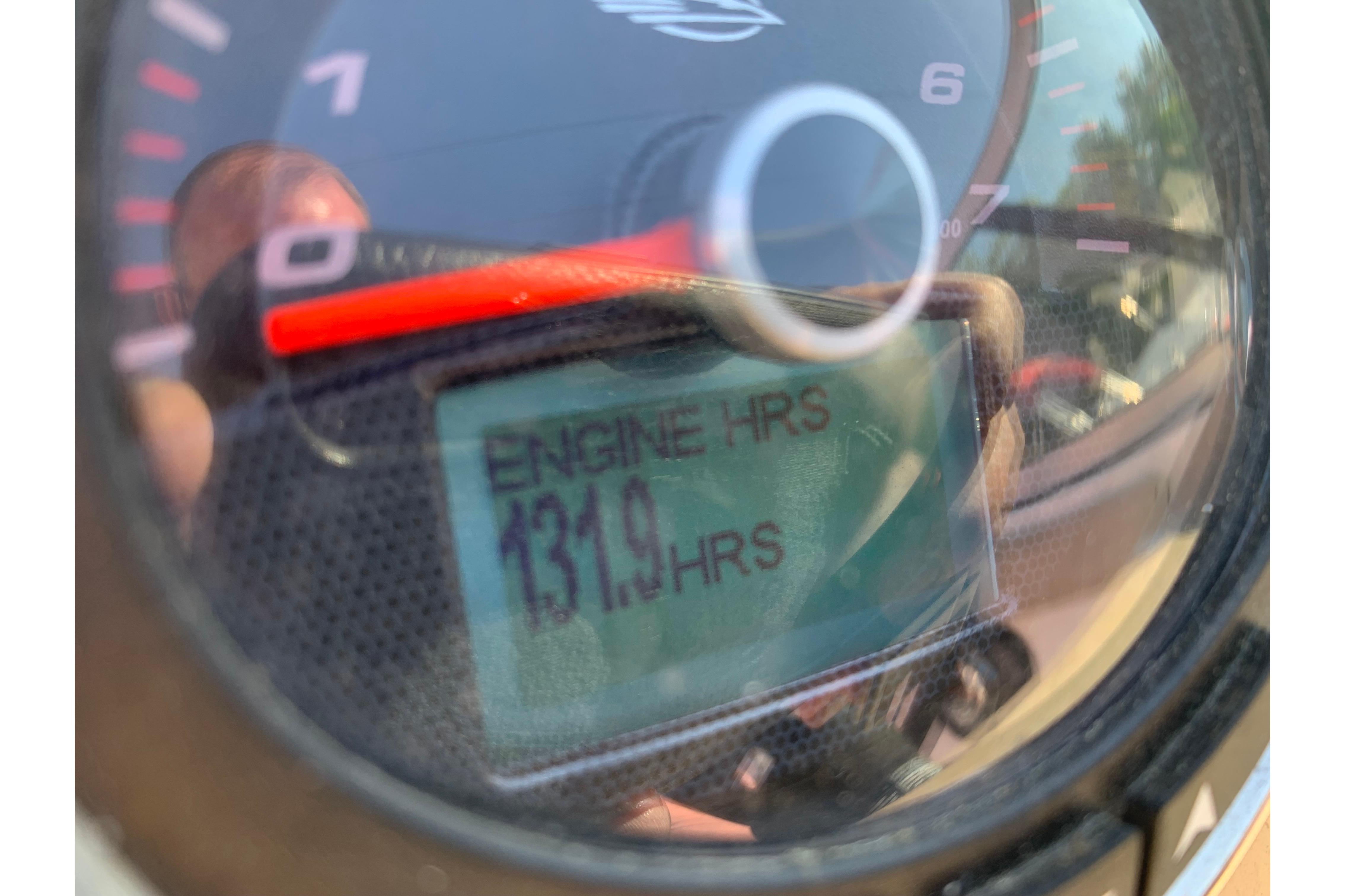Close-up of 2022 Chaparral 23 SSi engine hour meter displaying 131.9 hours.