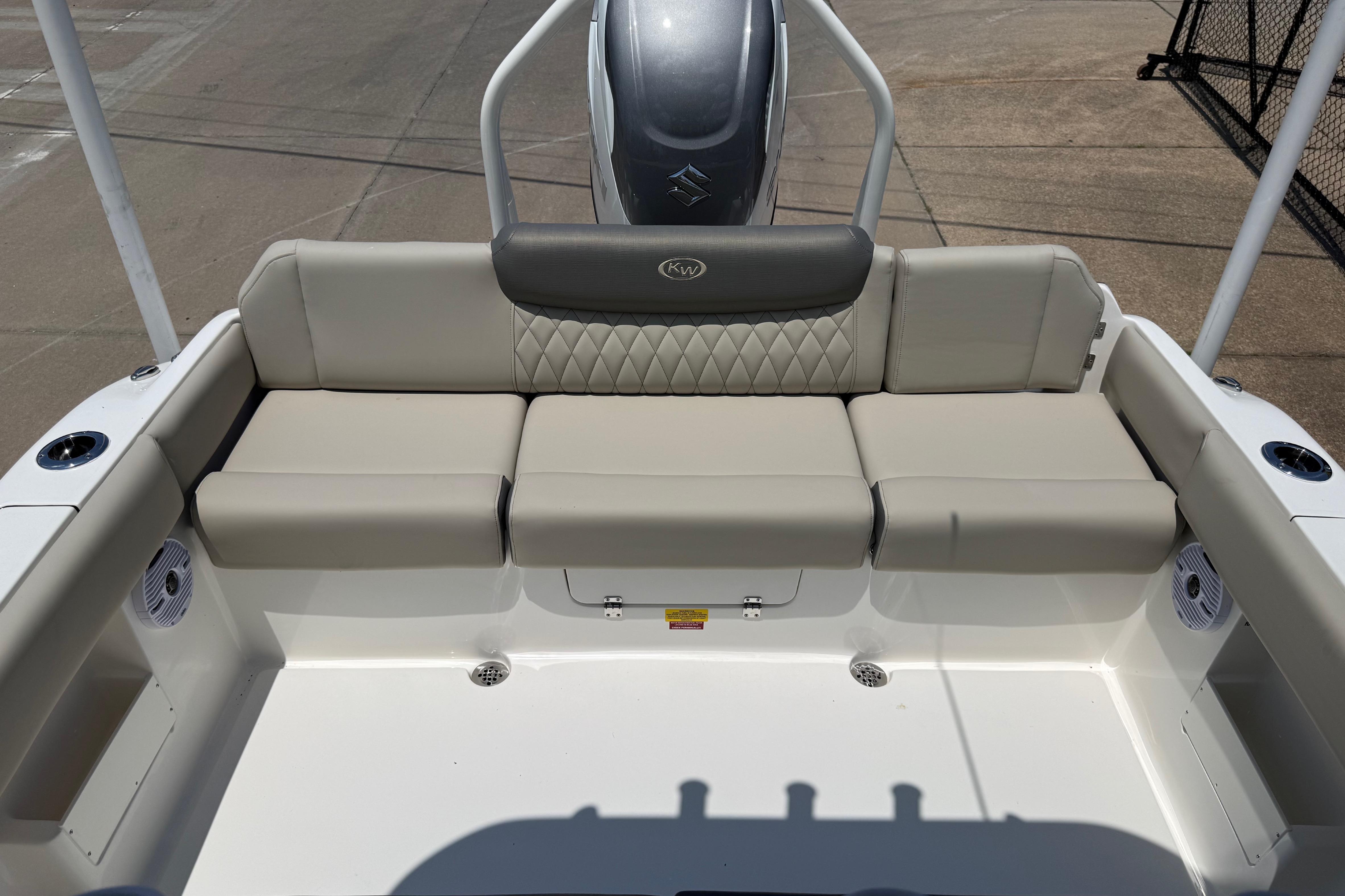 2027 Key West 249 FS boat interior with cushioned seating and modern design.