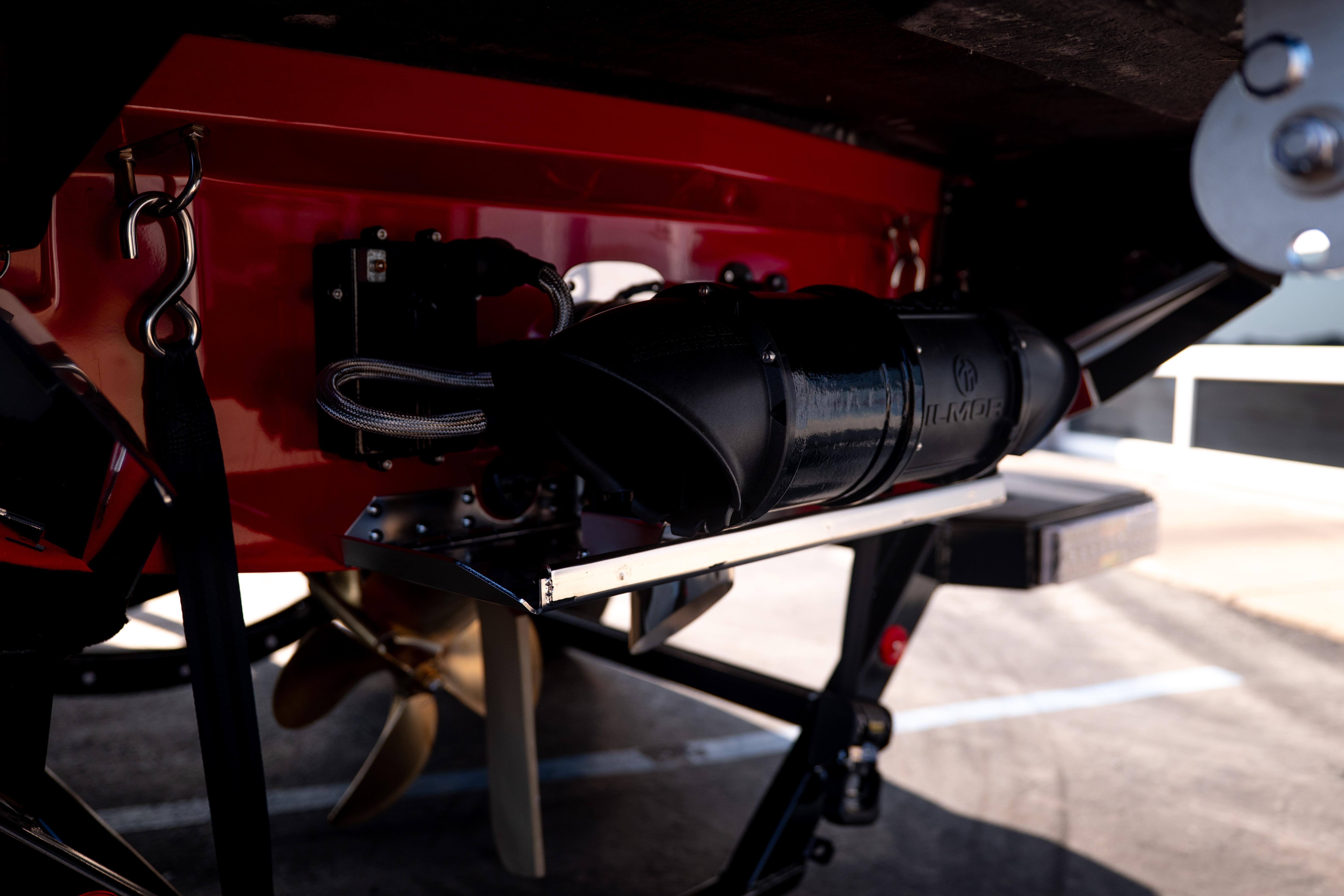 2027 MasterCraft XT24 boat underside with propeller and mechanical components.
