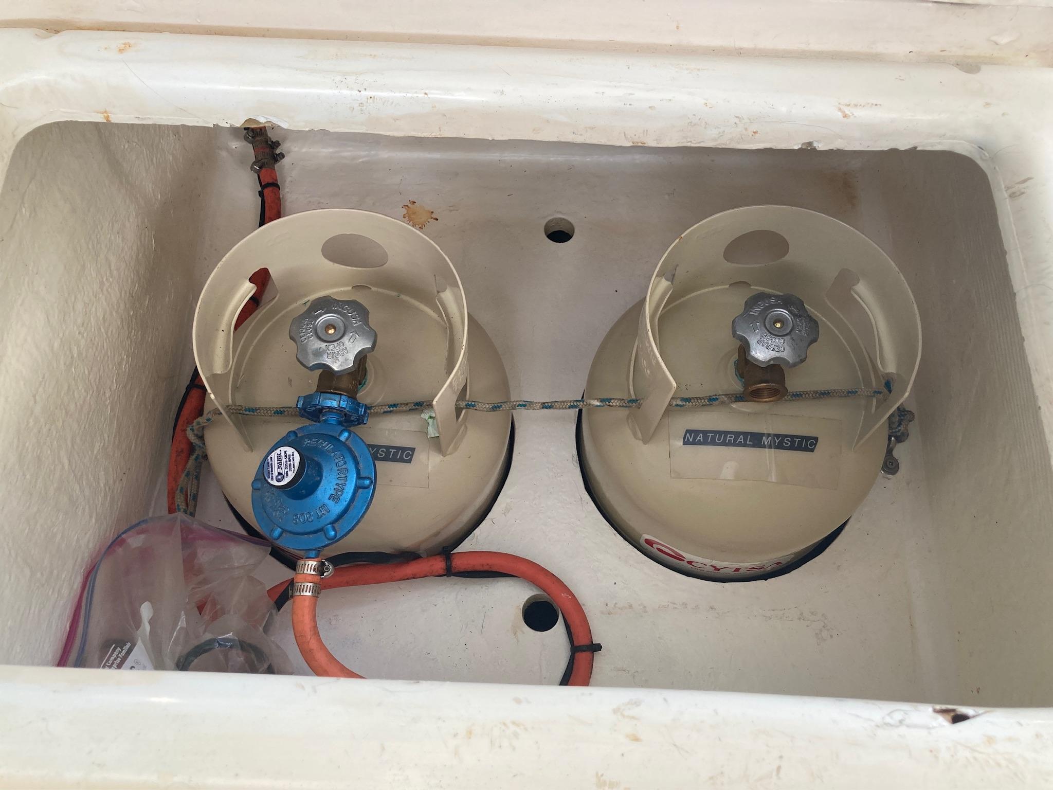 Two propane tanks with regulator in a 2009 Admiral 40 Executive Owner's version yacht.