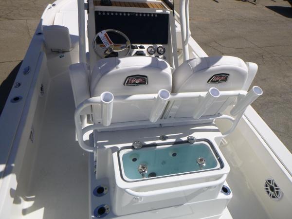2024 Ranger 2360 Bay boat interior with dual seats and fishing rod holders.