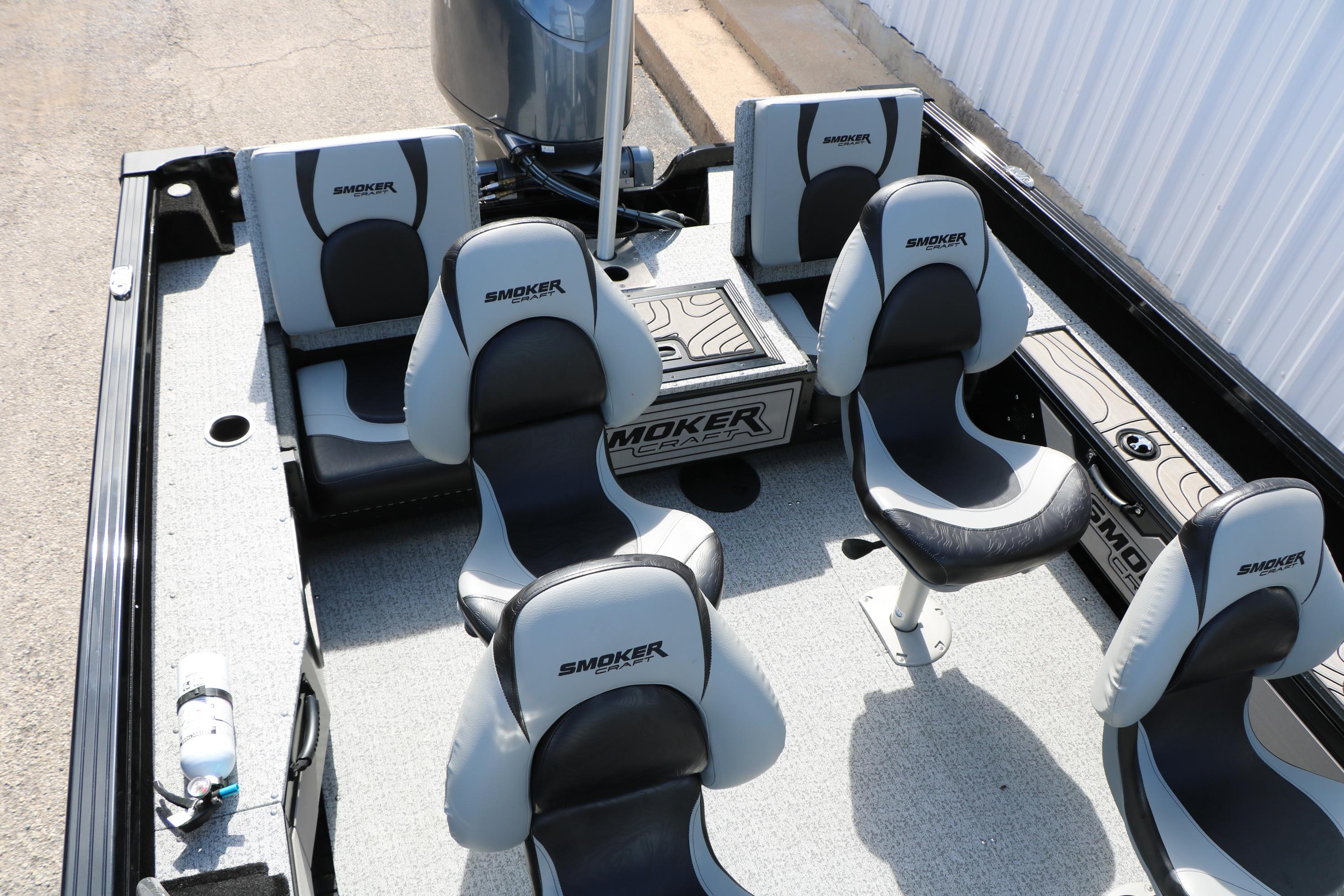2025 Smoker Craft Adventurer 188 DC boat interior with four cushioned seats.