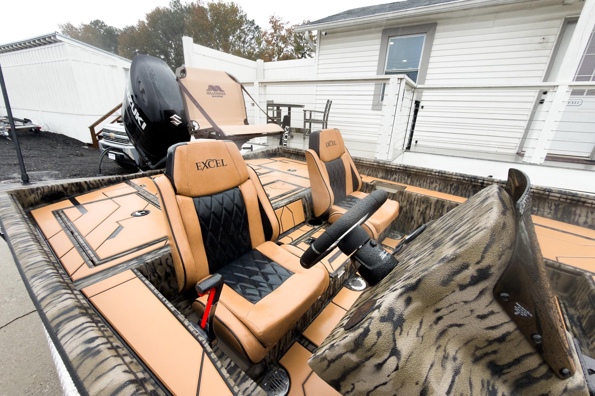 2026 Excel EX203C Crappie & Bass boat with tan and black seating, Suzuki motor.