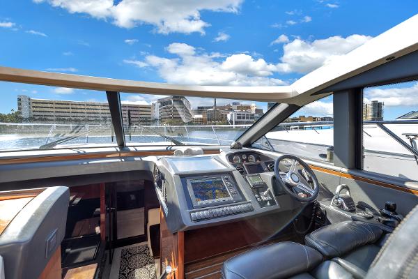 Interior view of 2013 Princess V57 yacht with modern cockpit.