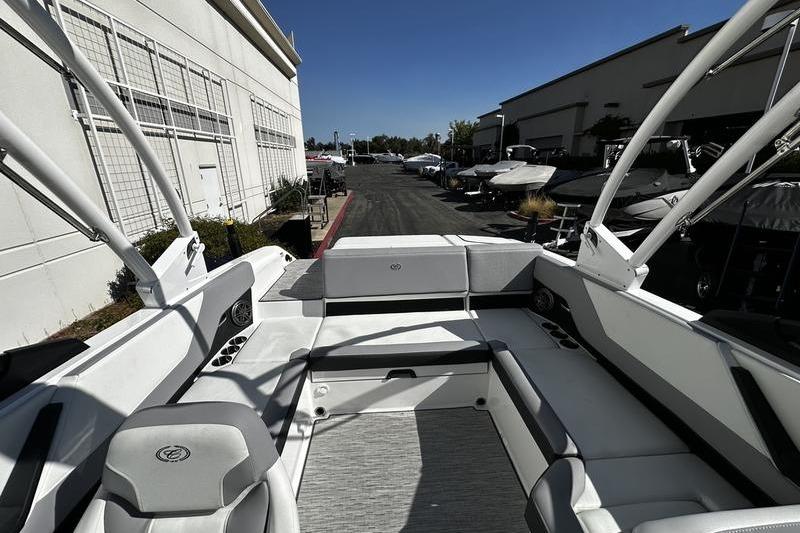 2025 Cobalt CS23 boat interior with white seating and modern design.