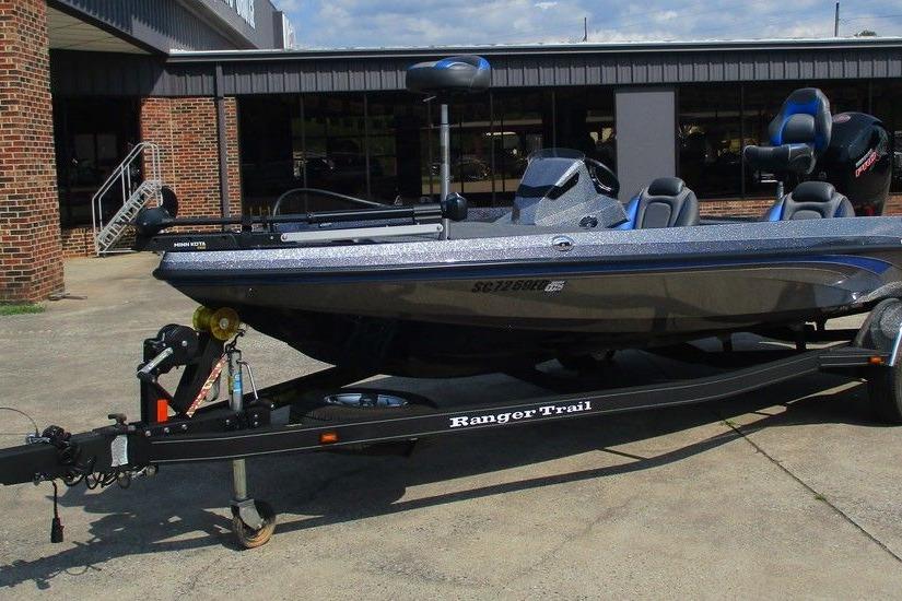 2022 Ranger Z185 boat on trailer, parked outside a building.