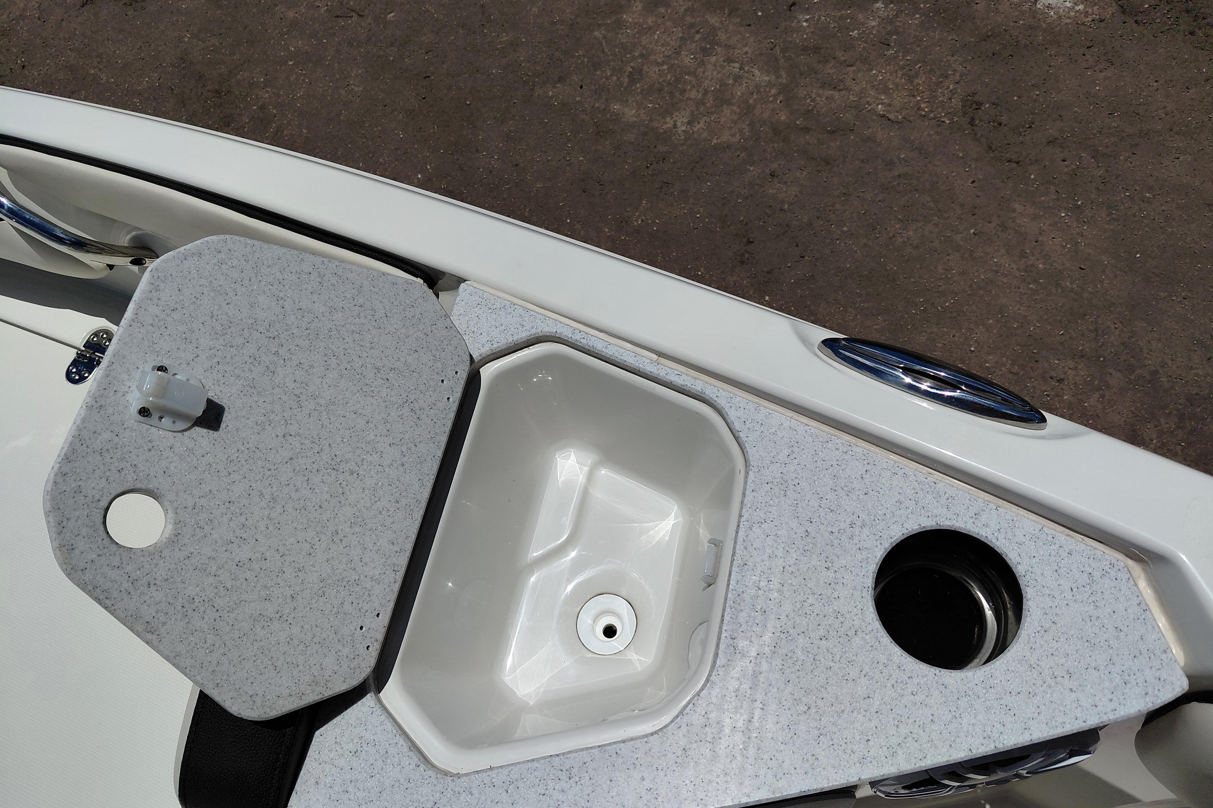 2023 Stingray 206 CC boat sink and countertop detail with cup holder.