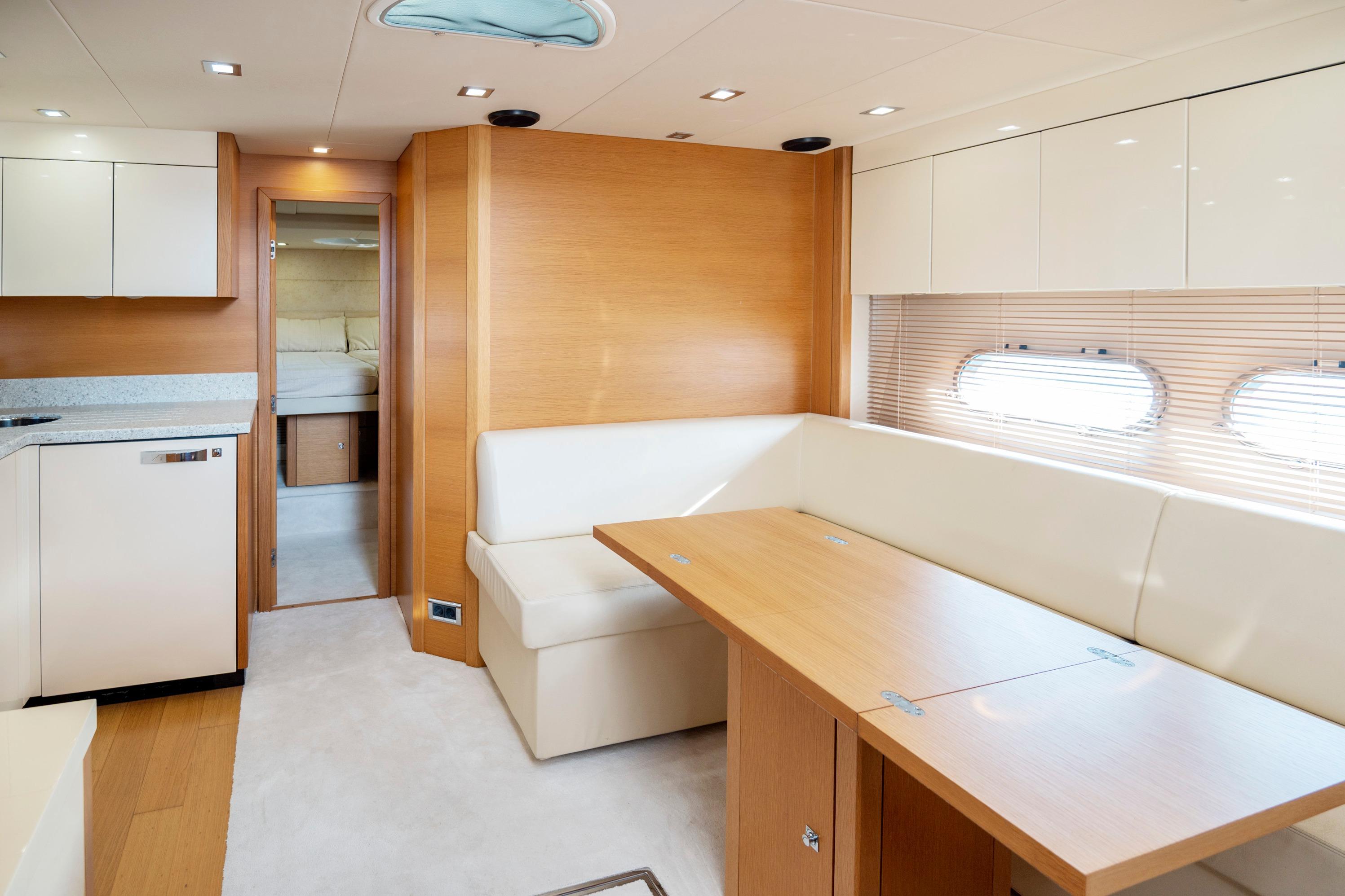 Luxurious interior of 2012 Sunseeker Portofino 48 yacht with modern furnishings.