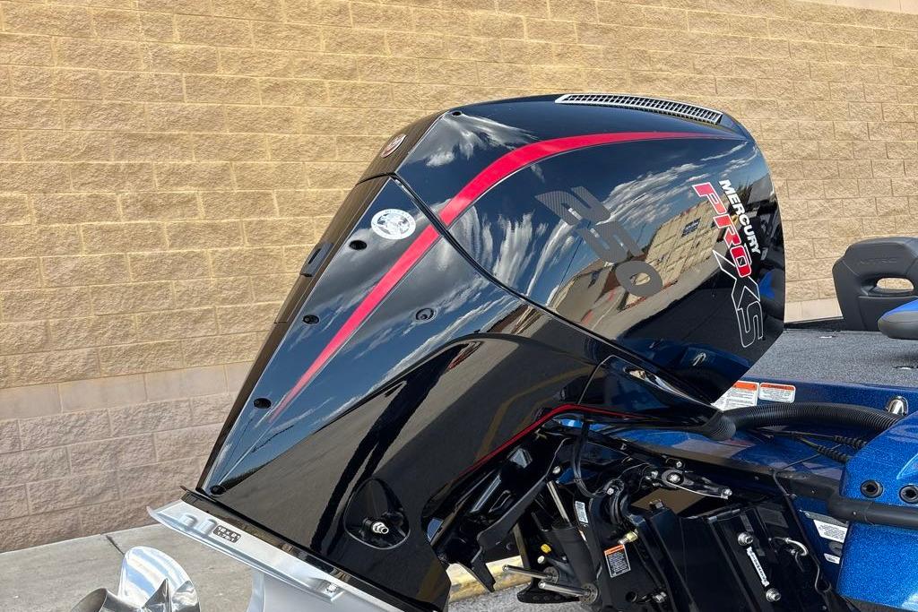 2026 Nitro Z20 XL Pro boat with Mercury Pro XS 250 engine, reflecting sky and clouds.
