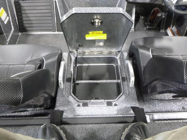 Interior of a 2025 Ranger Z520 boat showing seating and storage compartment.