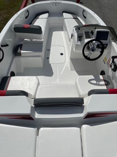 2024 Tahoe T16 boat interior with seating and steering console.