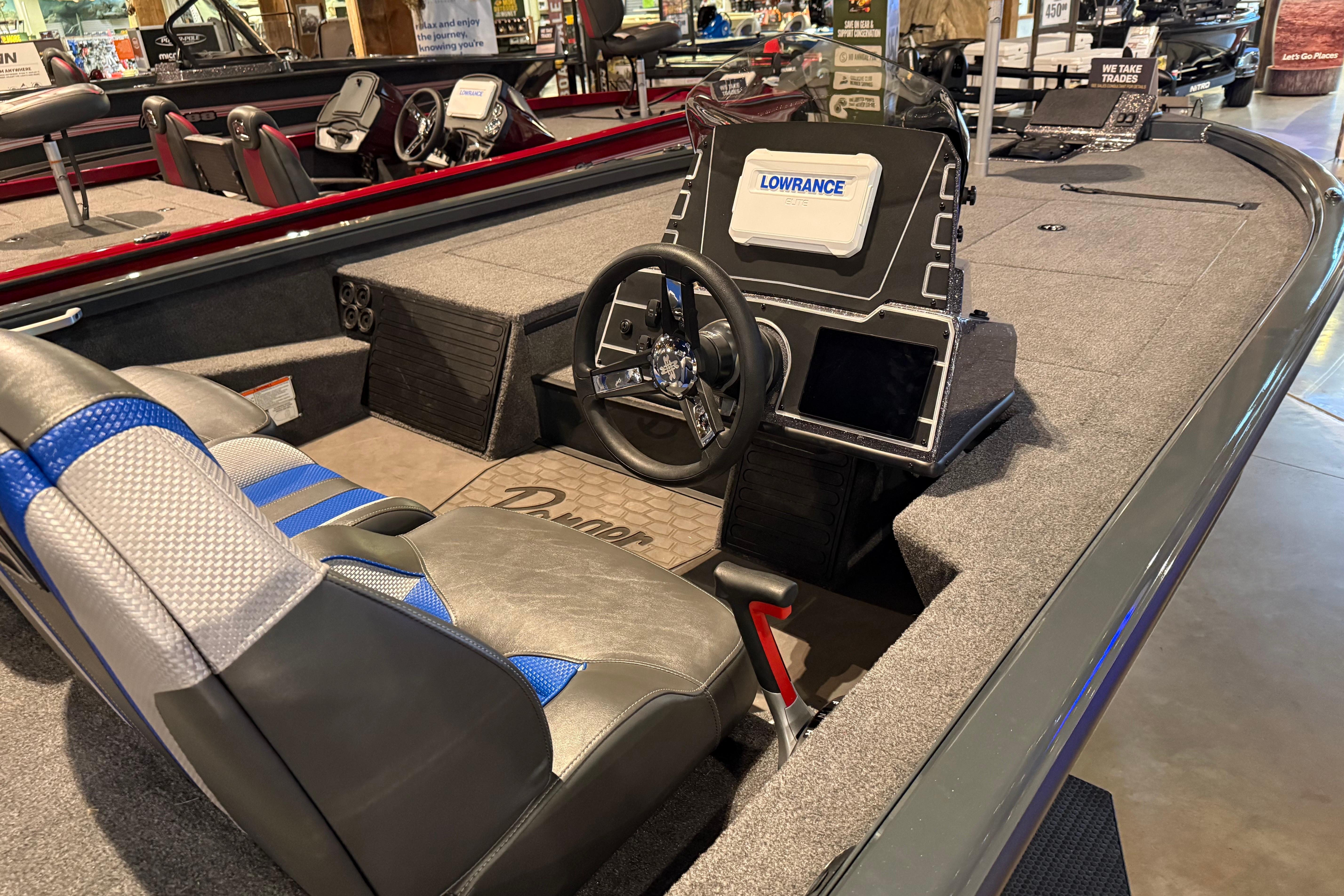 2025 Ranger ALPHA 208 boat interior with steering wheel and navigation system.