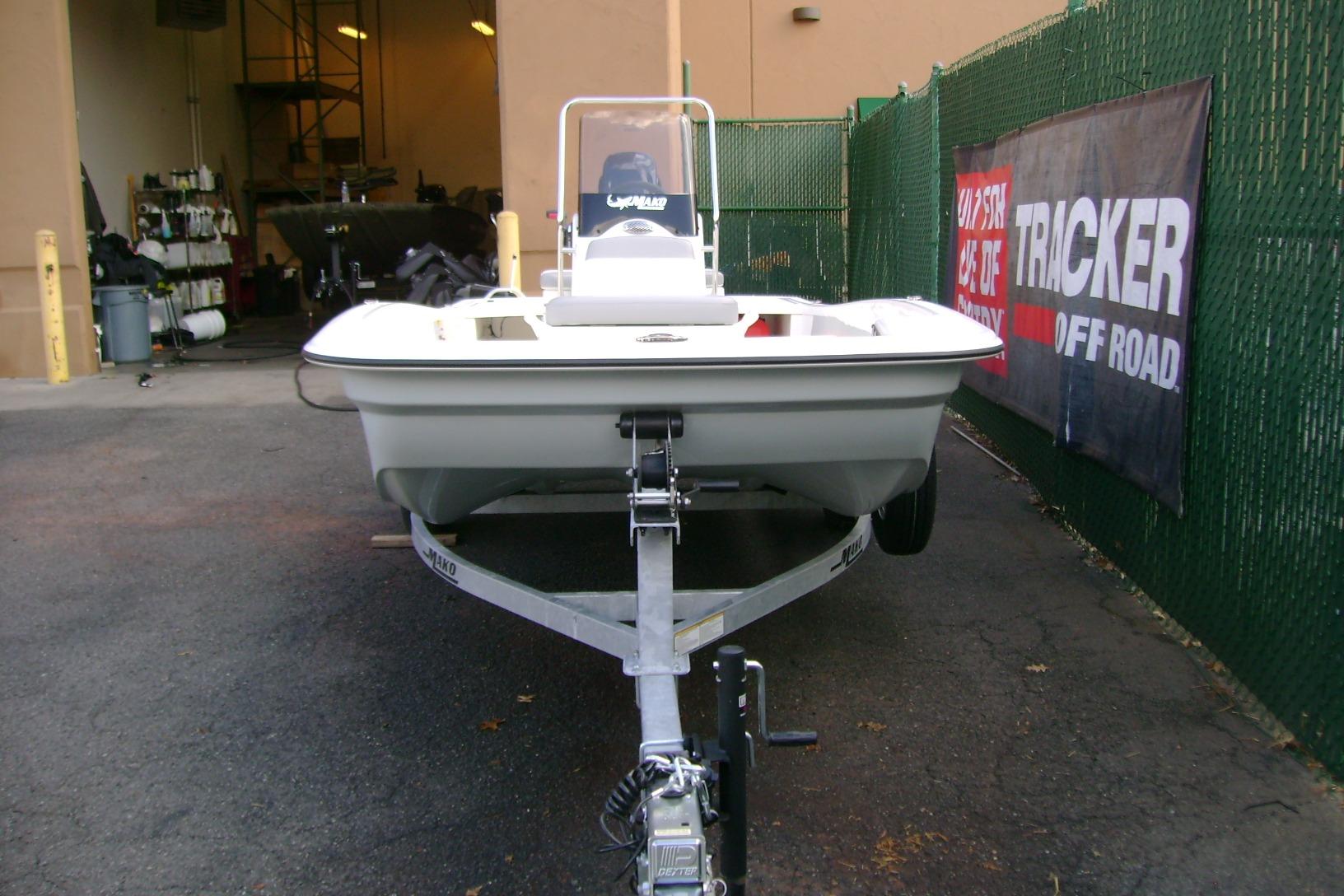 2026 Mako Pro Skiff 15 CC boat on trailer in outdoor setting.