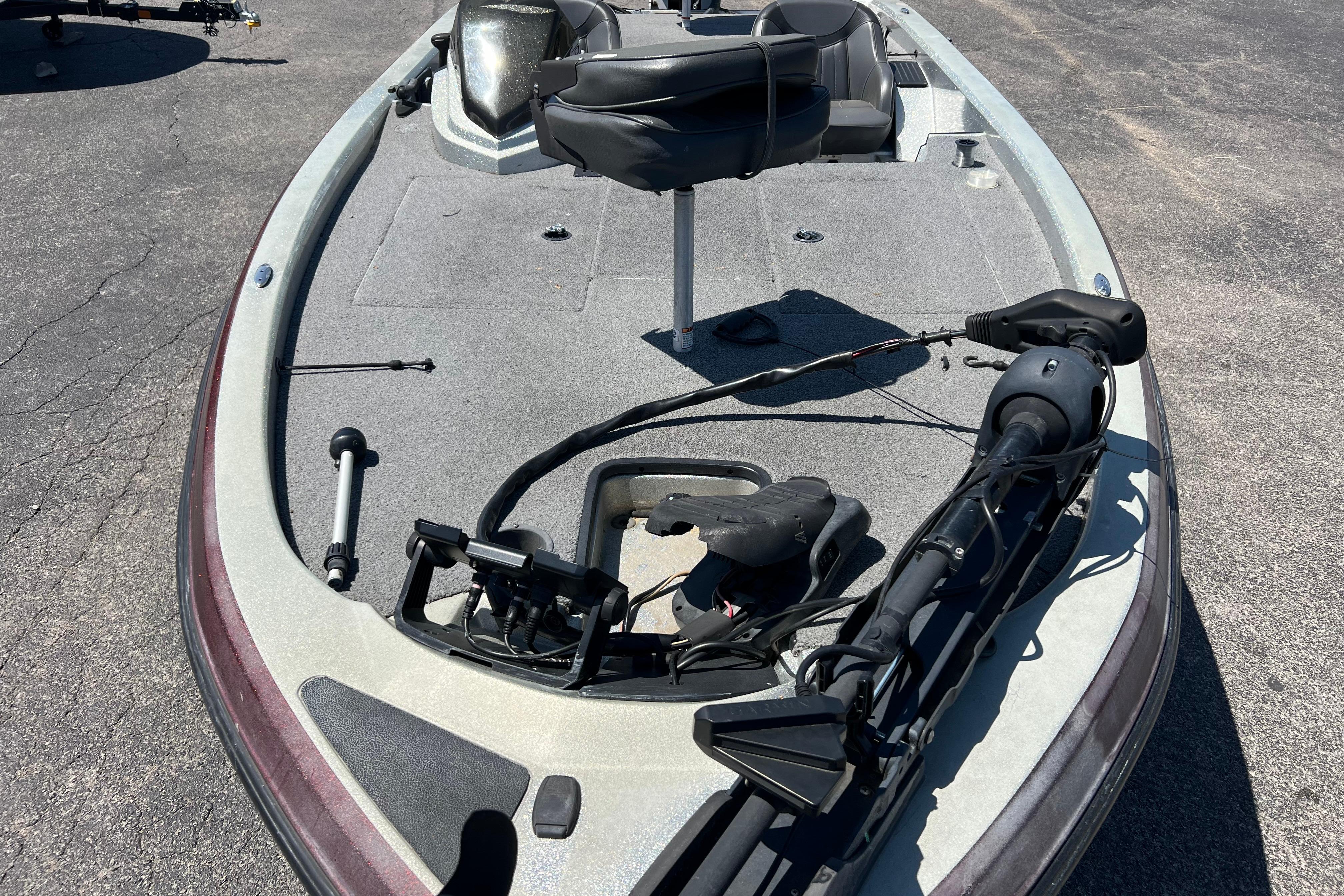 2015 Stratos 186 VLO fishing boat with trolling motor and seating on deck.