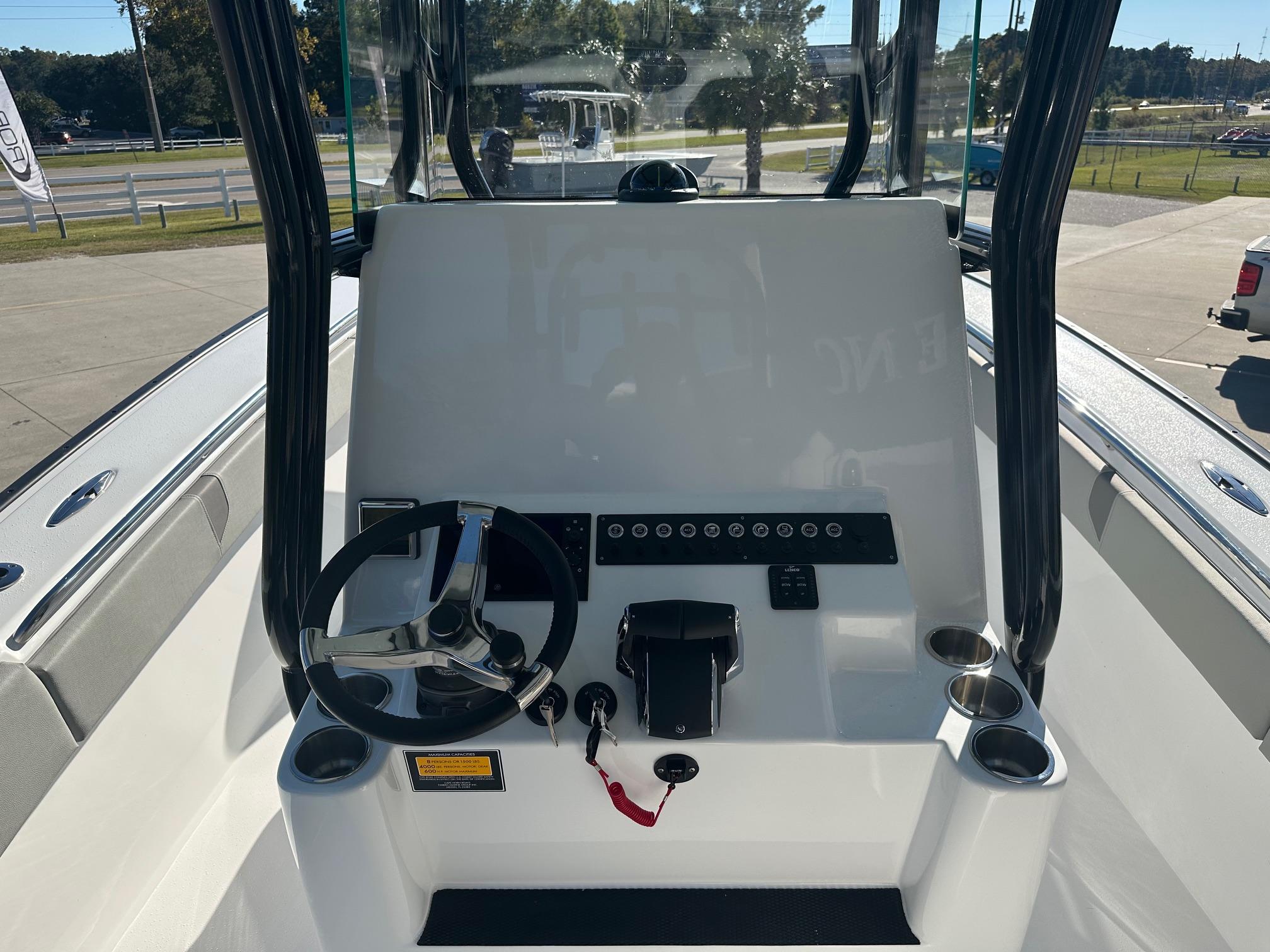 2025 Cape Horn 28XS boat console with steering wheel and controls.