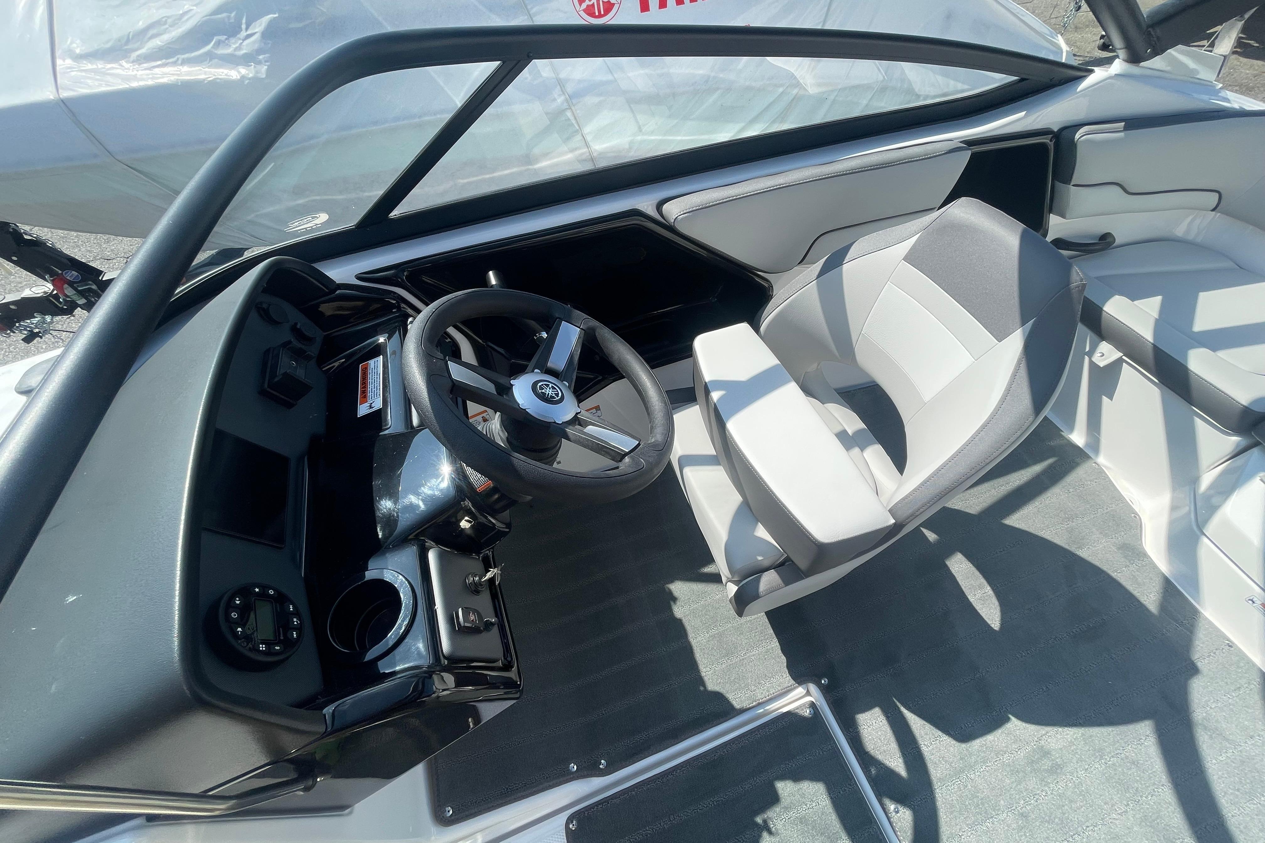 2026 Yamaha Boats AR190 interior with steering wheel and seating.