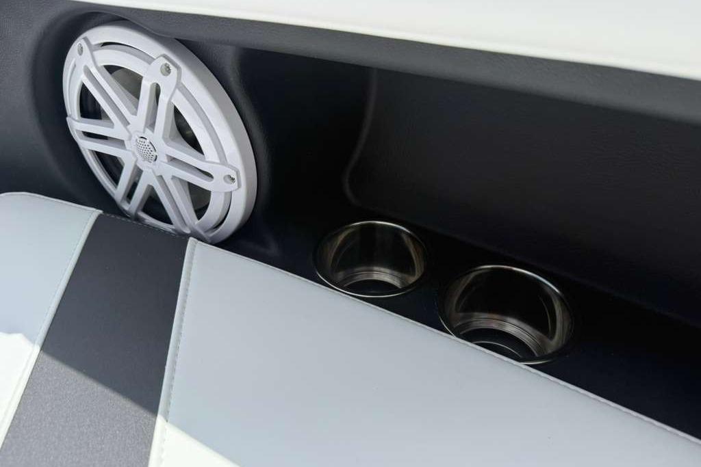 2026 Monterey Elite 30 OB interior with speaker and cup holders.