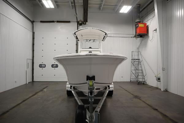2025 Sea Fox 228 Commander boat in a spacious indoor garage.