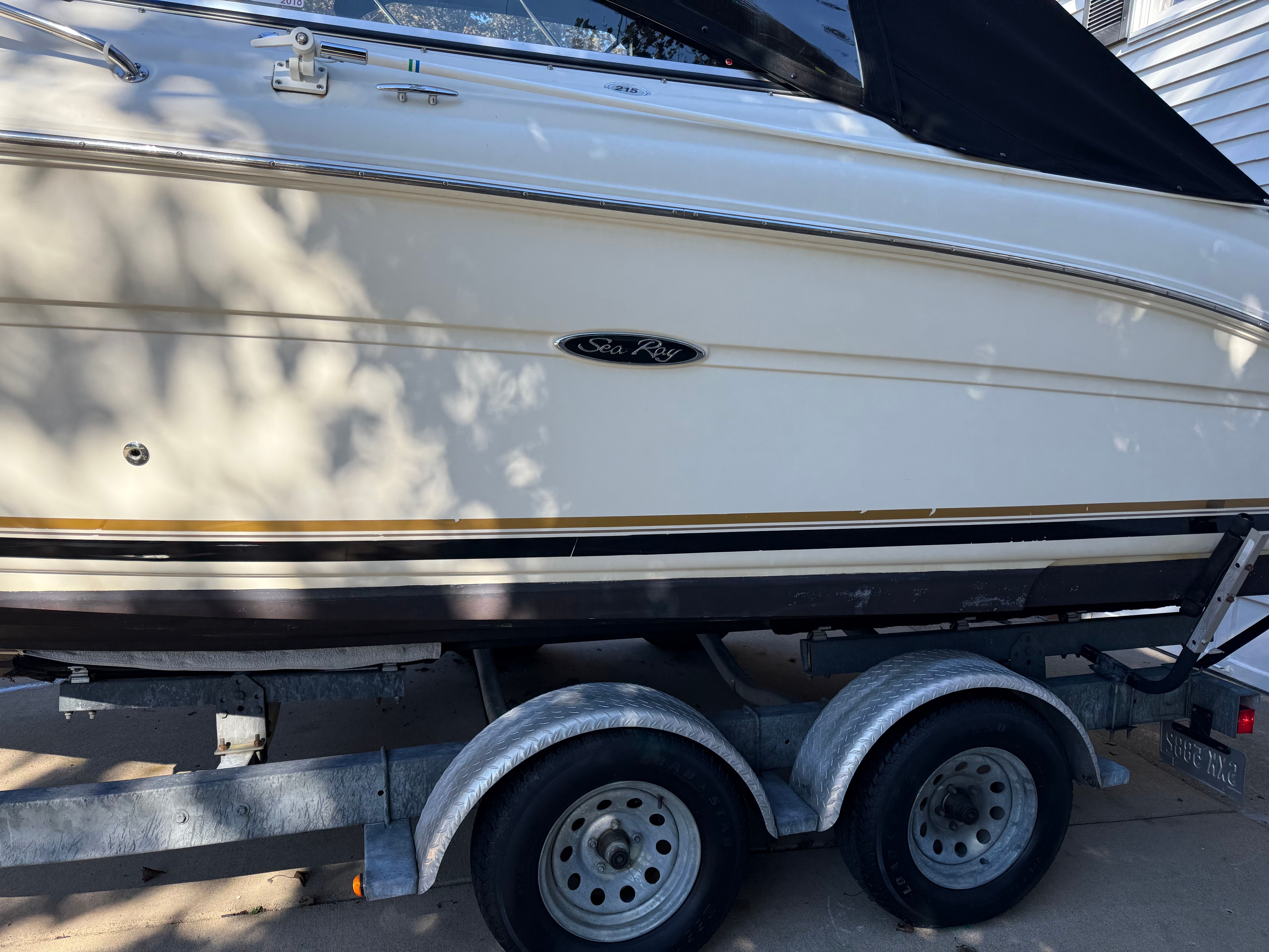 2006 Sea Ray 215 Weekender on trailer, side view.
