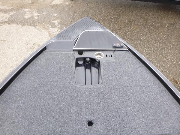 2025 Ranger Z521 boat deck with storage compartment and control panel.
