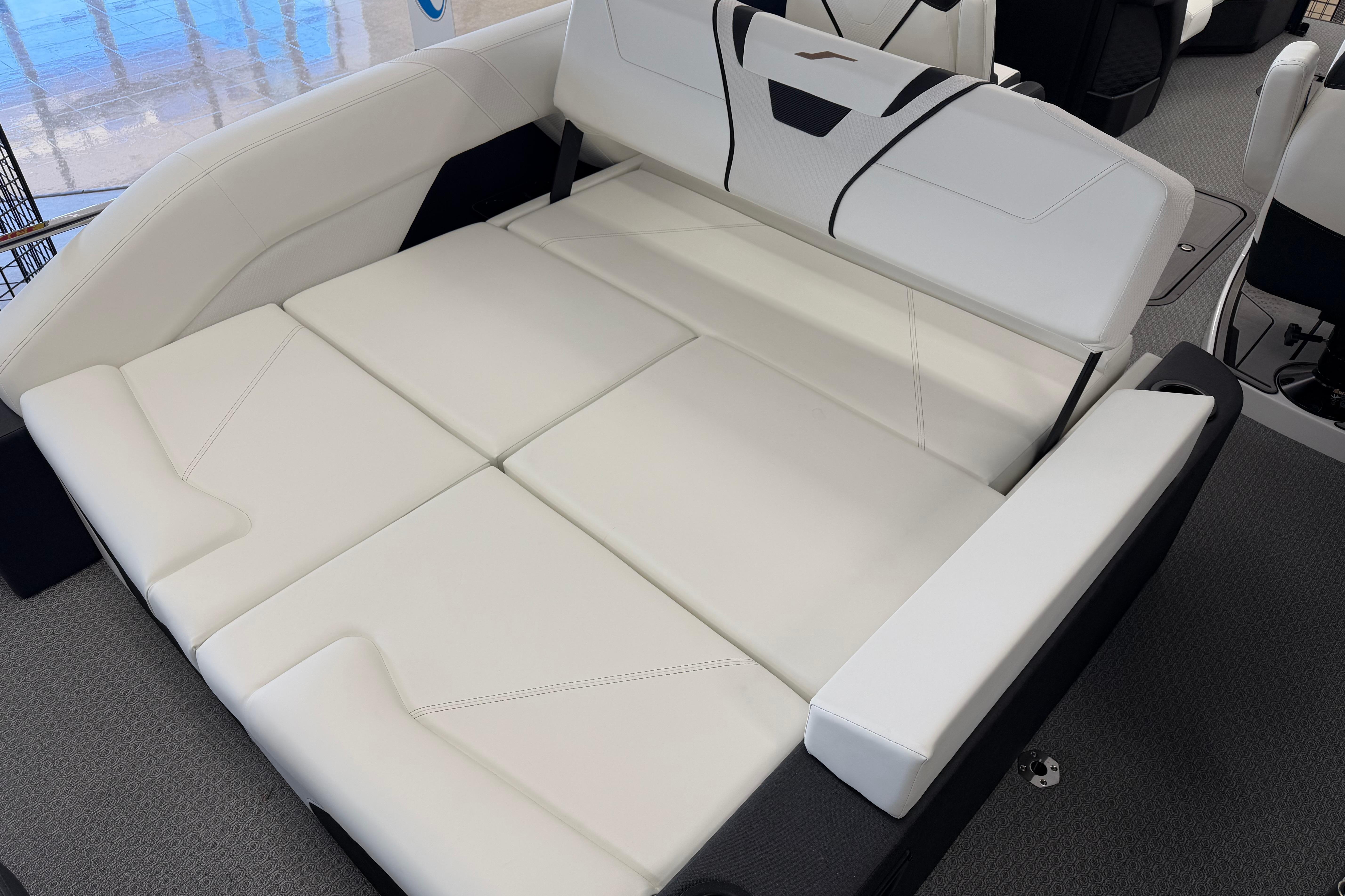 Luxurious white seating in 2026 Evotti 721CS boat, showcasing modern design and comfort.