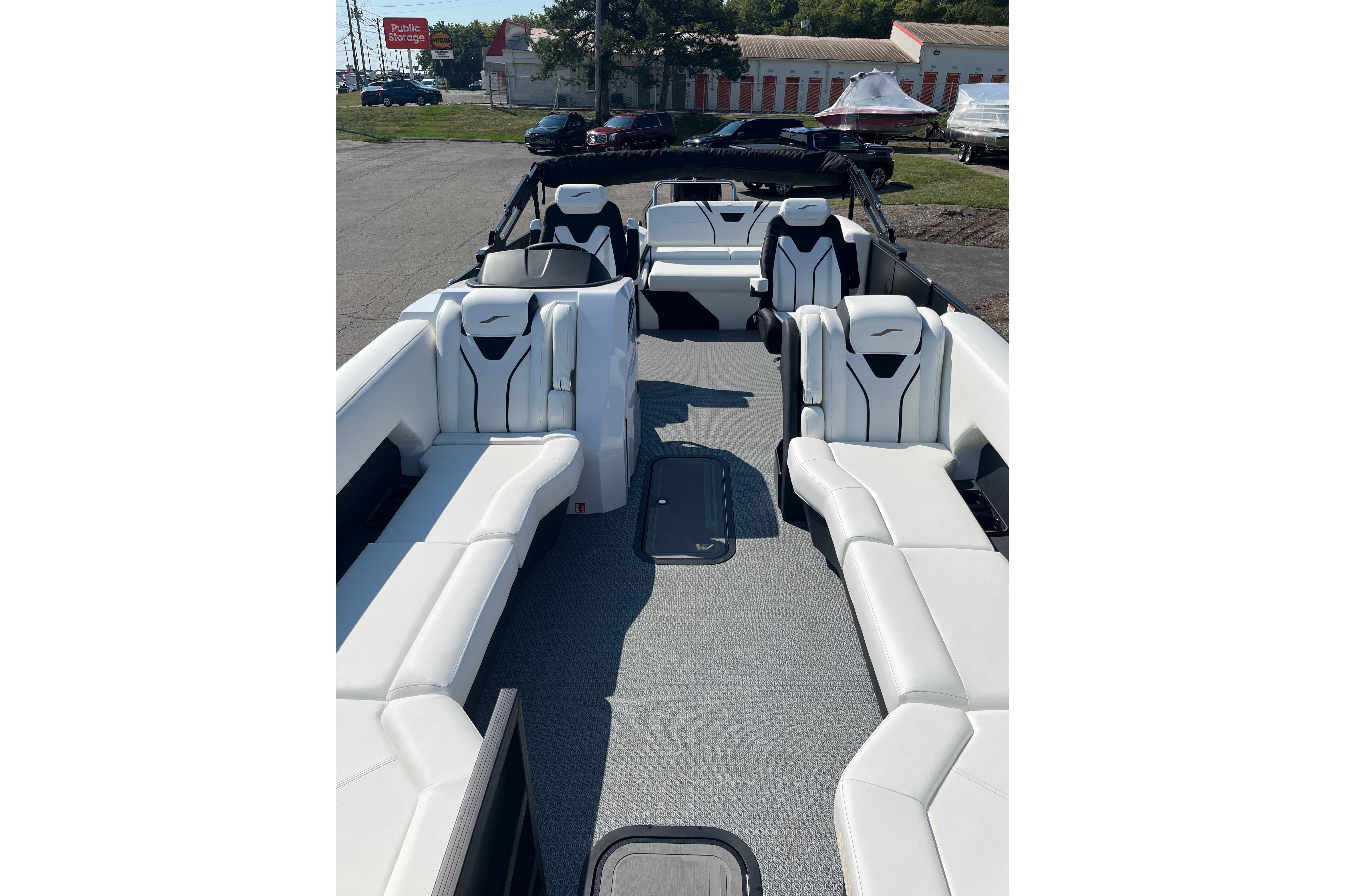 Luxurious 2026 Evotti 725CS boat interior with sleek white seating and modern design.