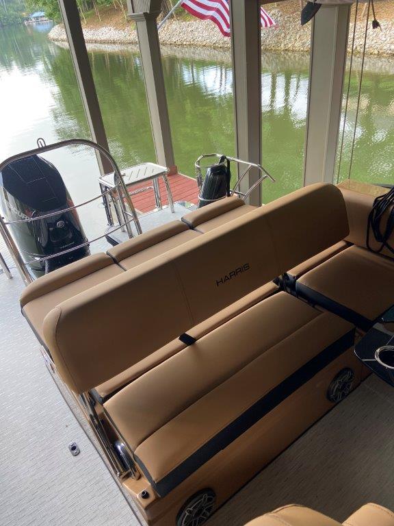 2023 Harris FloteBote 250 Grand Mariner pontoon boat interior with tan seating.