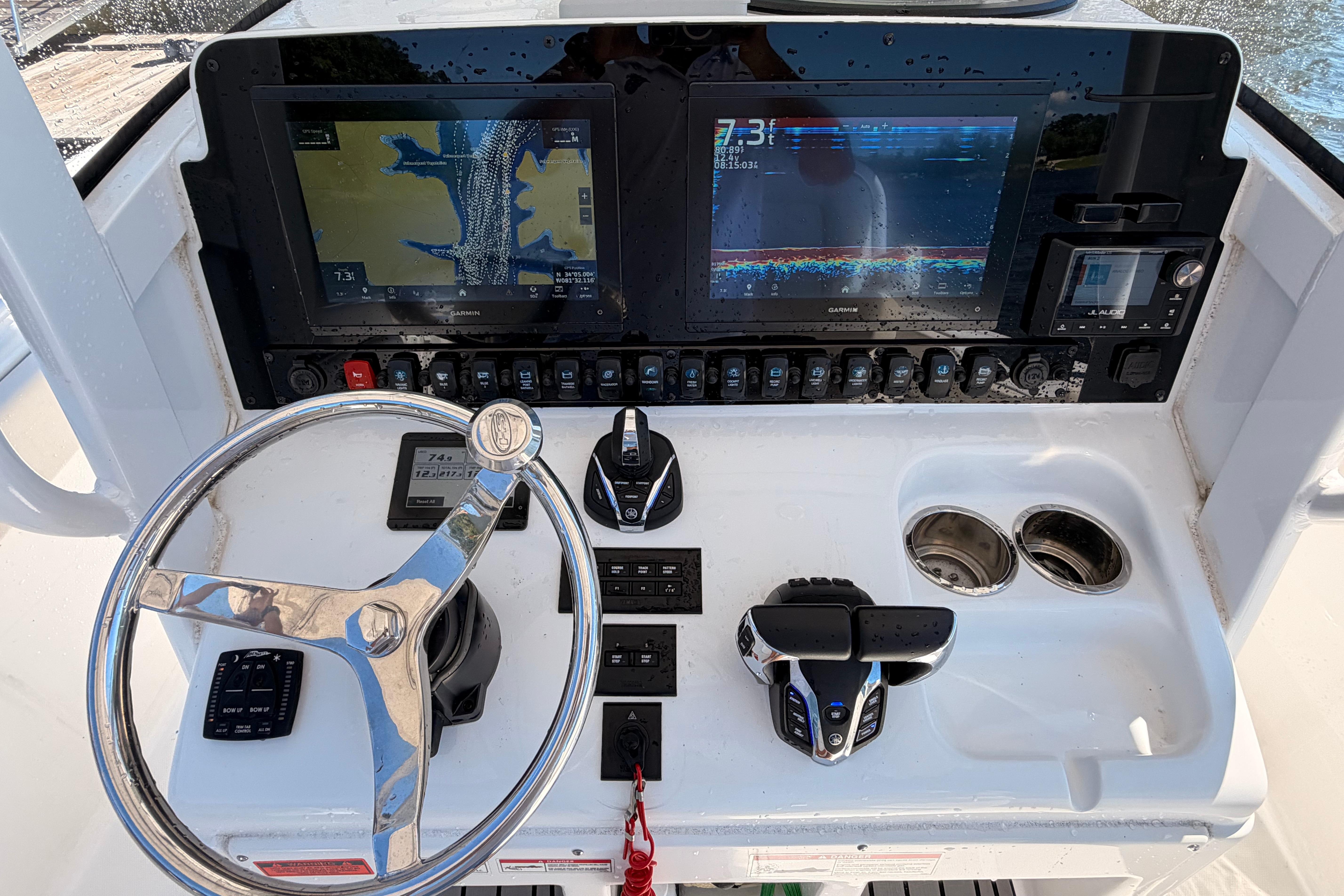 2024 Sea Hunt Gamefish 27 Coffin Box dashboard with navigation screens and controls.